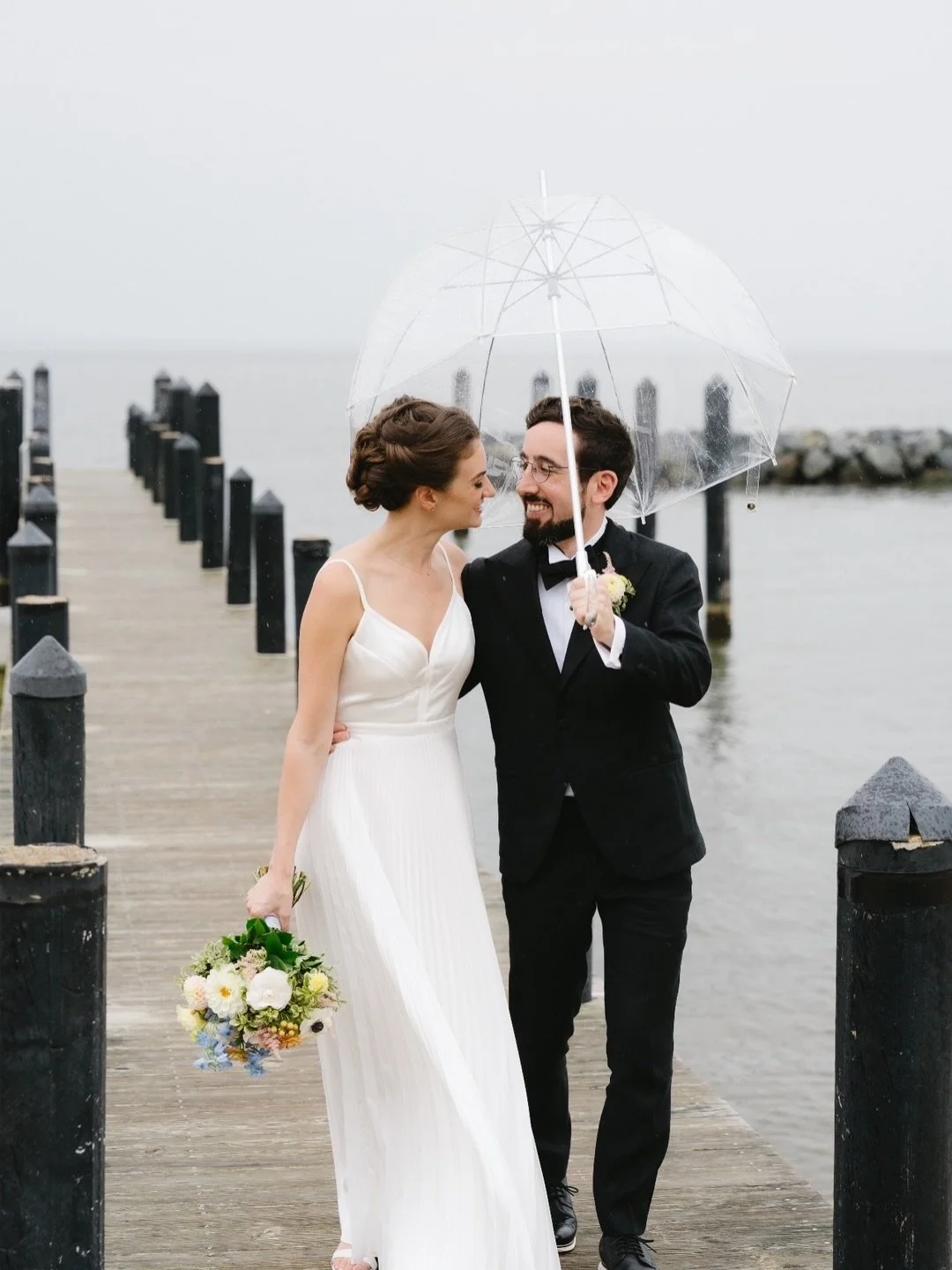 This couple didn&rsquo;t let a little drizzle stop there perfect dock photos from happening ☔️
⠀⠀⠀⠀⠀⠀⠀⠀⠀
Weather can be hard to predict, but at CBF Events we have the perfect rain plan to make sure your day is still beautiful. Learn more about our ve
