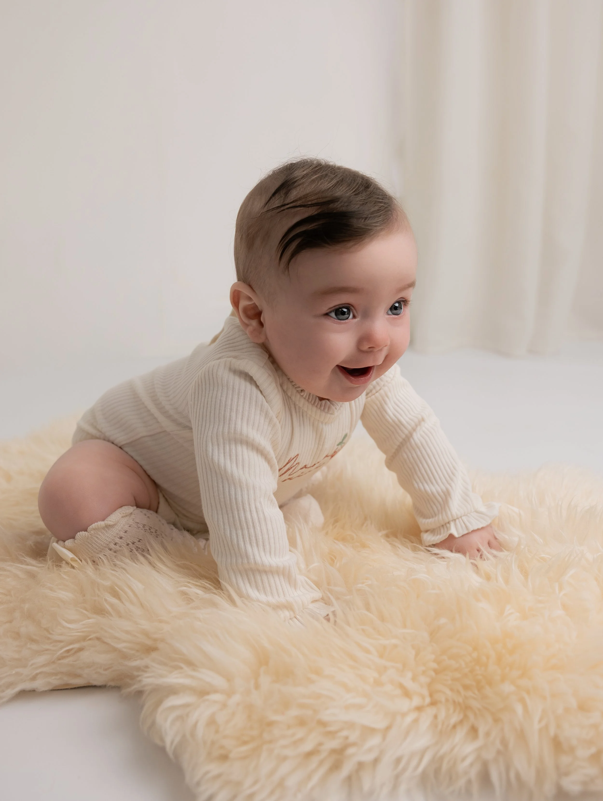 baby sitting for a photoshoot