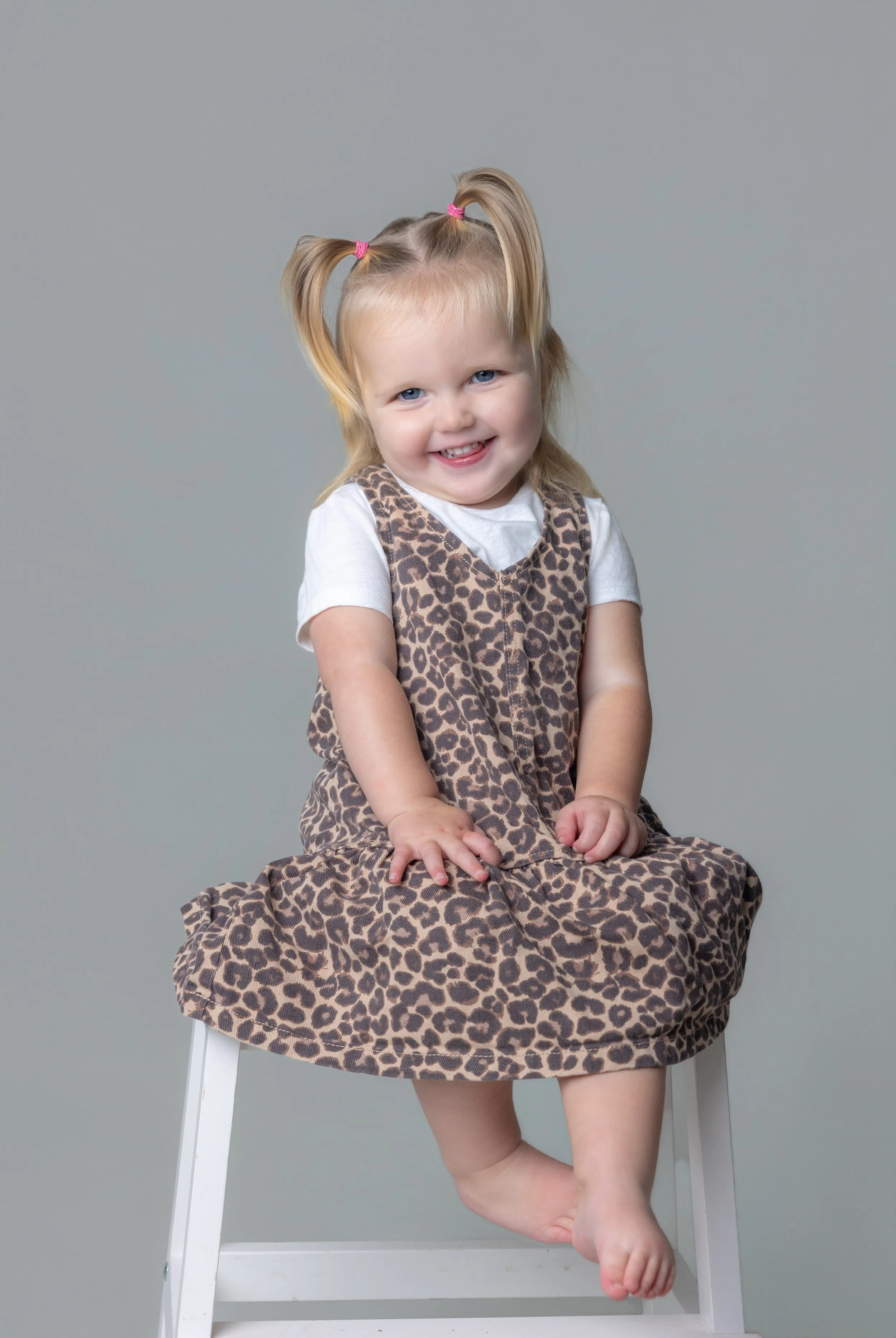 GIRL SMILING AT CAMERA