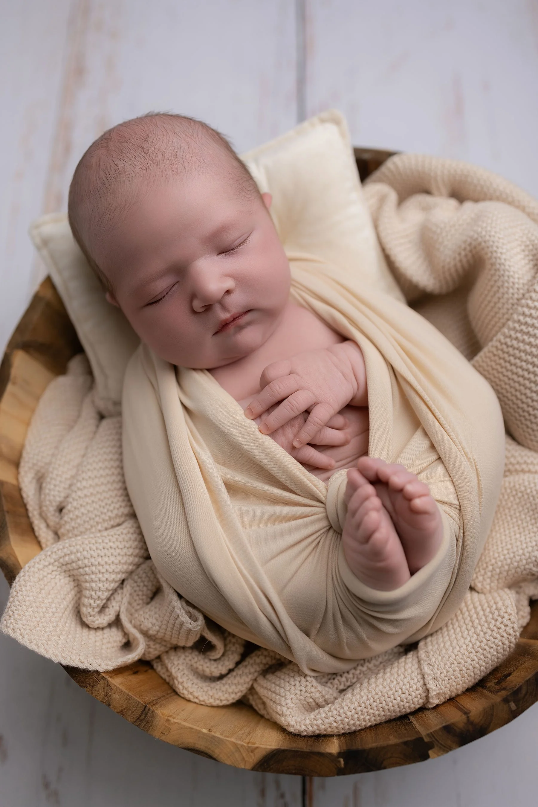 baby wrapped on a photoshoot accrington