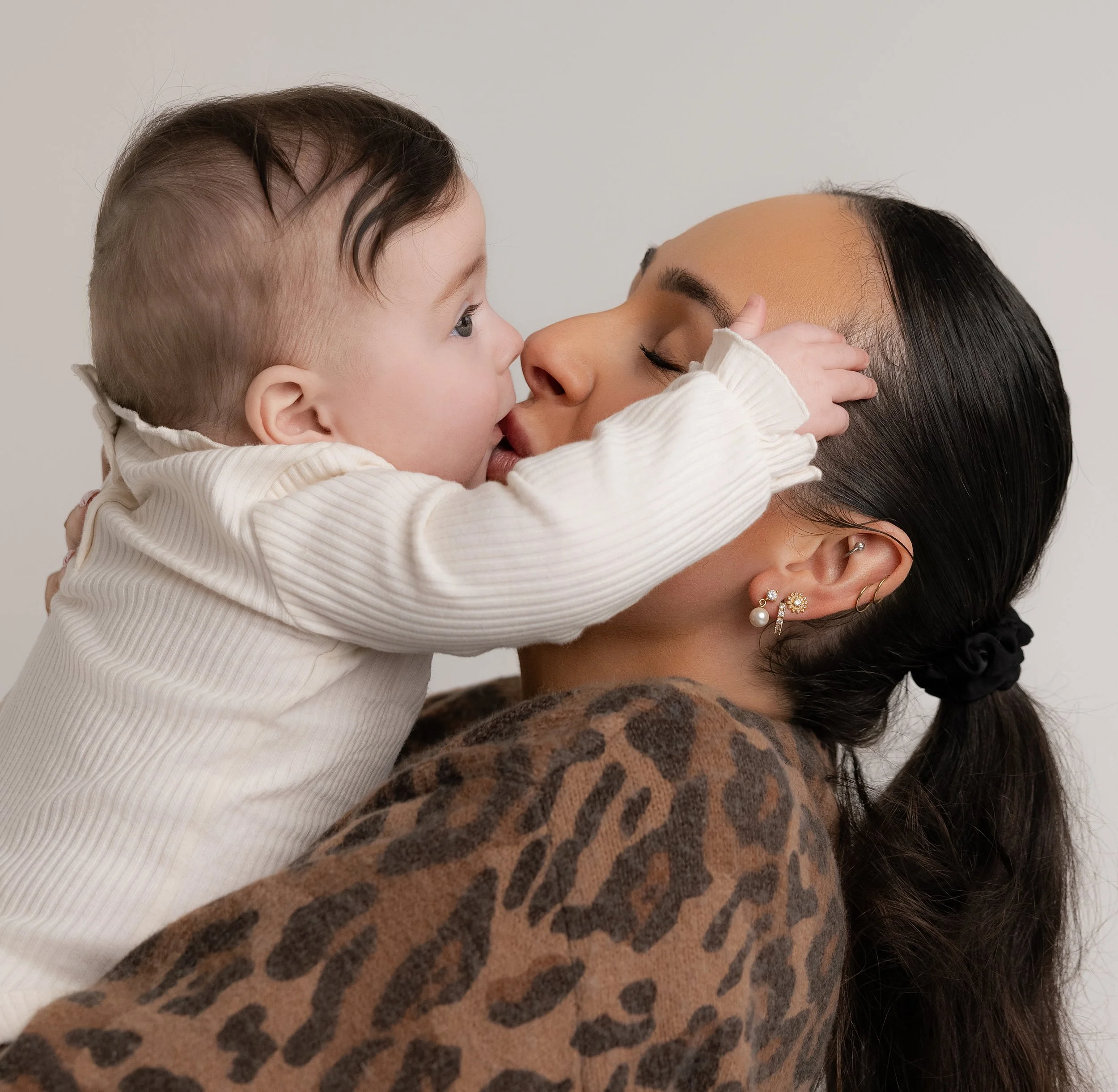 BABY KISSING MUM
