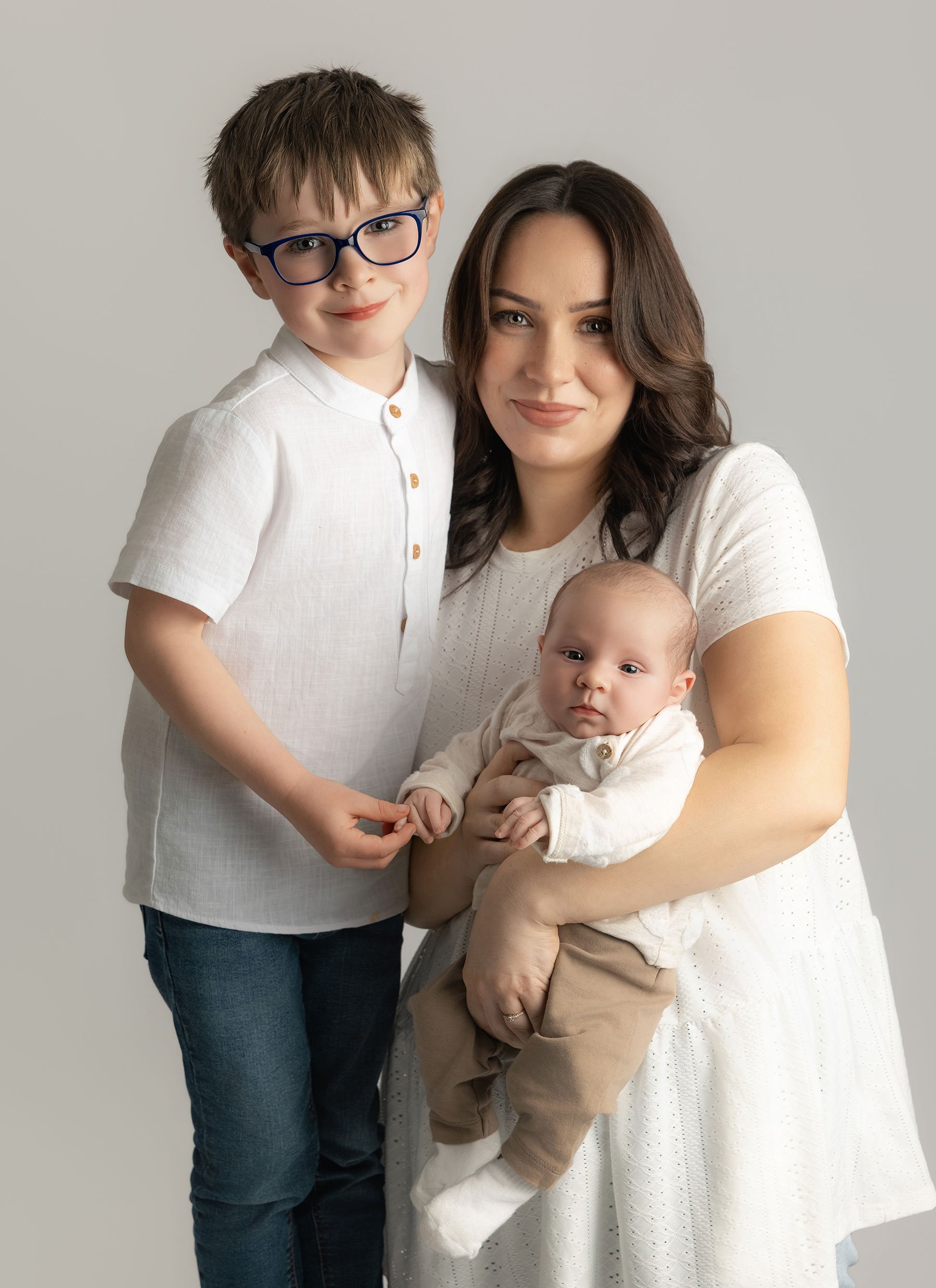 mum and her two children on a photoshoot