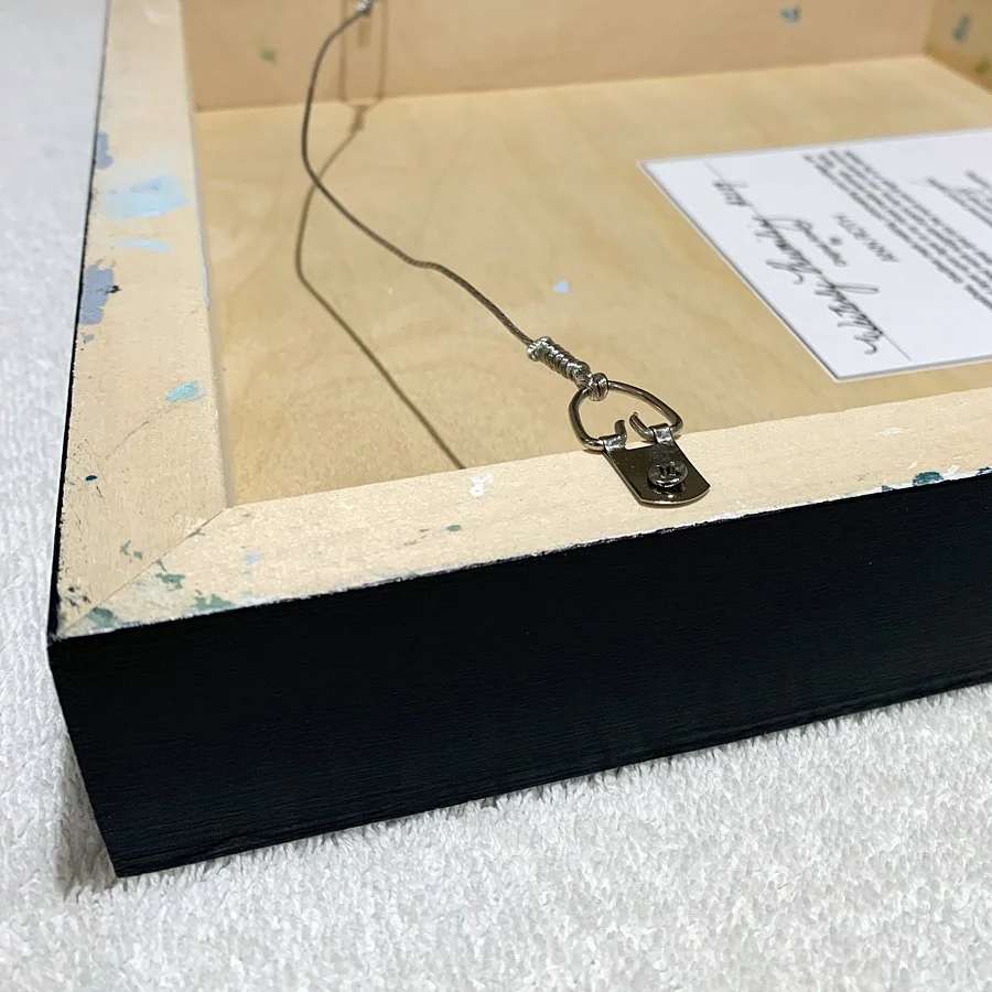 back of painting label and hardware
