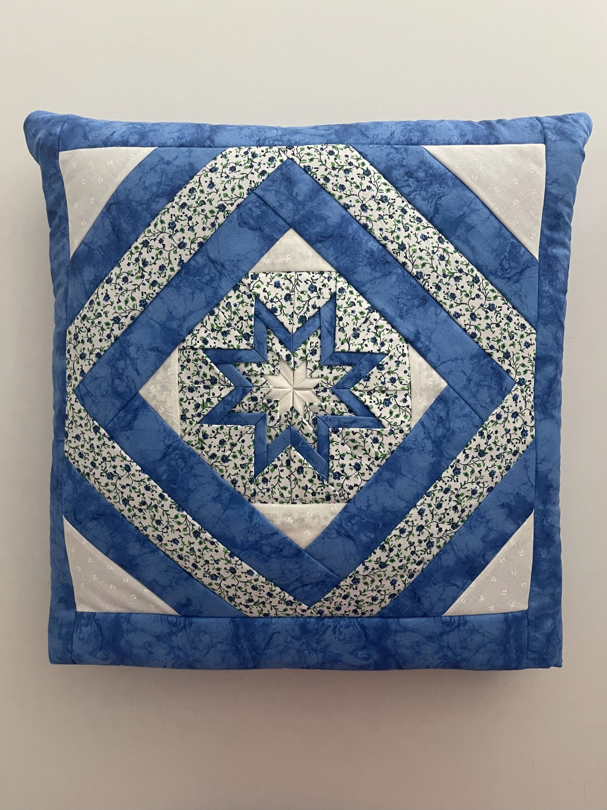 bright blue floral folded star.jpeg