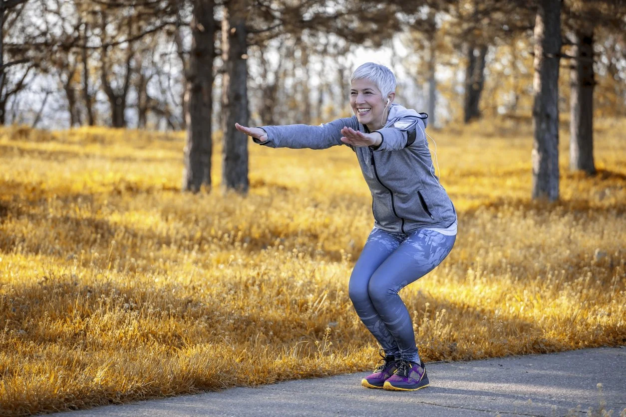 Older woman exercising outdoors