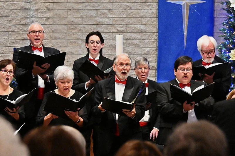 River City Chorale choir performing during a holiday concert