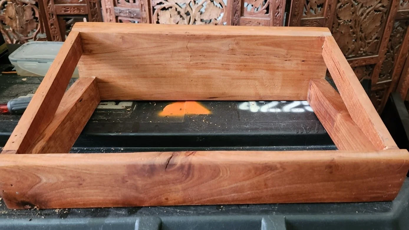 Pine laptop stand with a cherry stain.