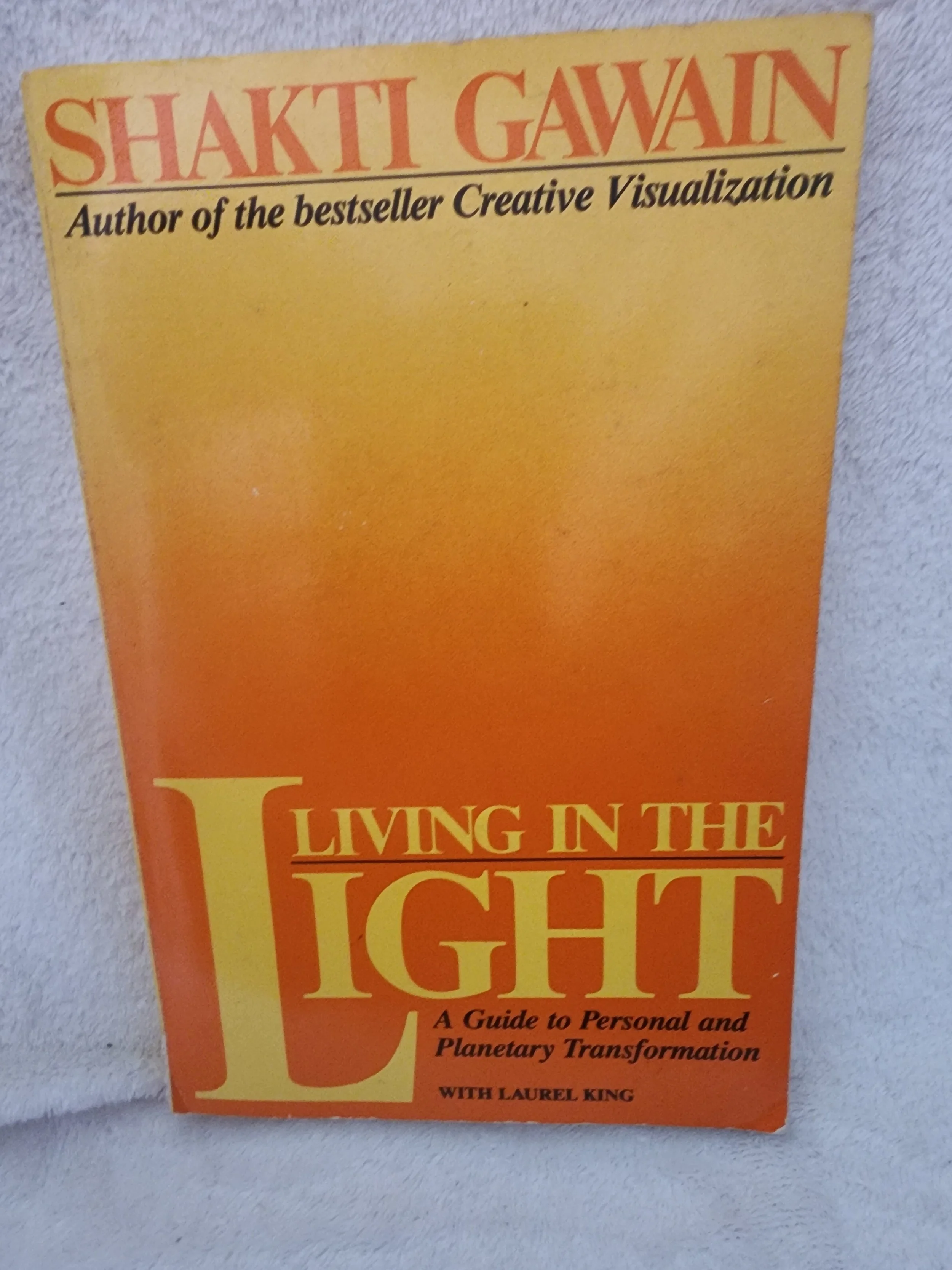 Living in the Light: A Guide to Personal and Planetary Transformation.