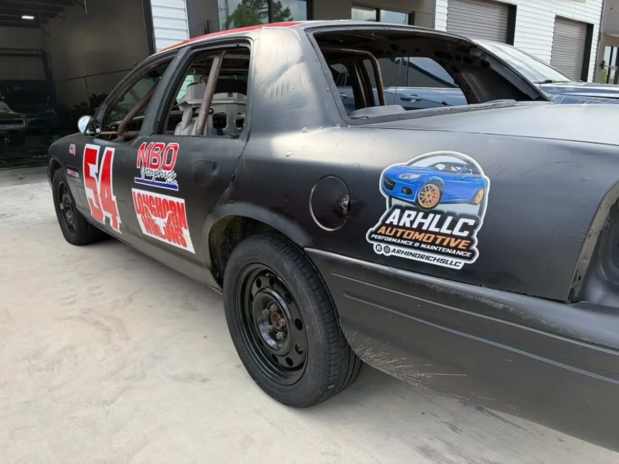 @tyhymelracing sporting our big beautiful logo! This is our newest racecar sponsorship. This is the same Crown Victoria I installed 3.73 gears and an LSD into recently. #arhindrichsllc #thatmiatashop