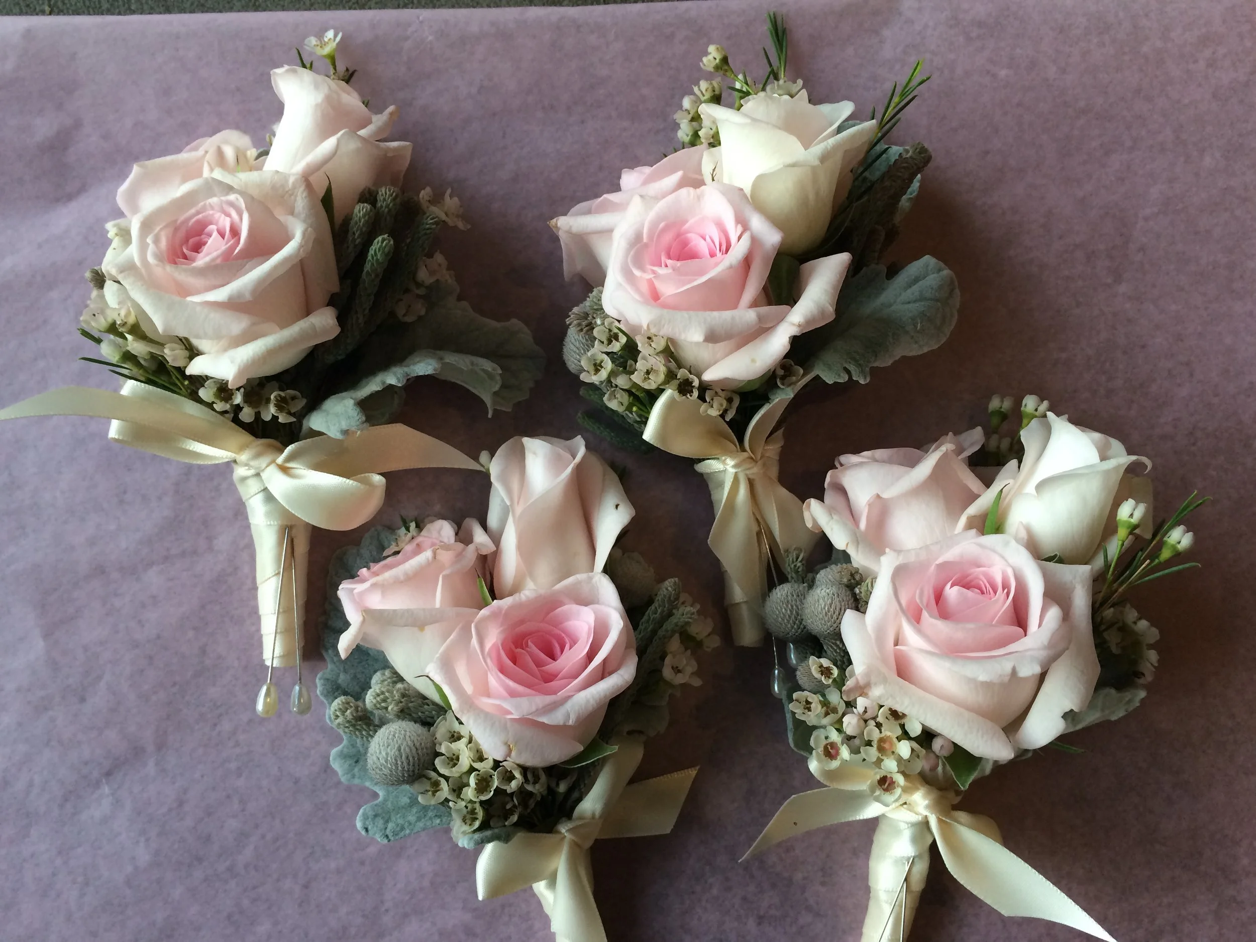 Pink pin-on corsages copy.JPG