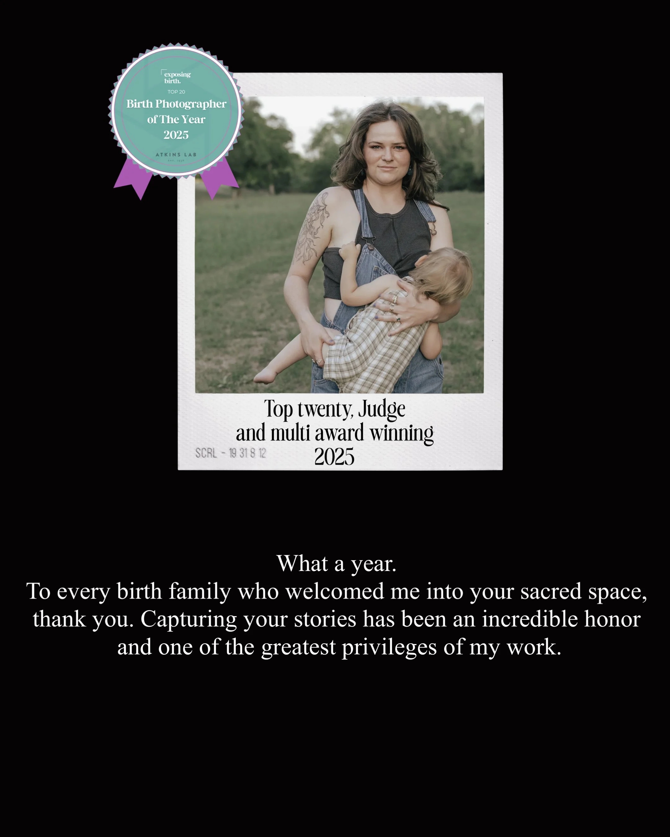 An award-winning photograph of a woman holding a young child outdoors in a grassy field with trees in the background. The woman has shoulder-length dark hair, wears a sleeveless black top, and has a tattoo on her arm. The child is wearing a plaid shirt and is hugging the woman.