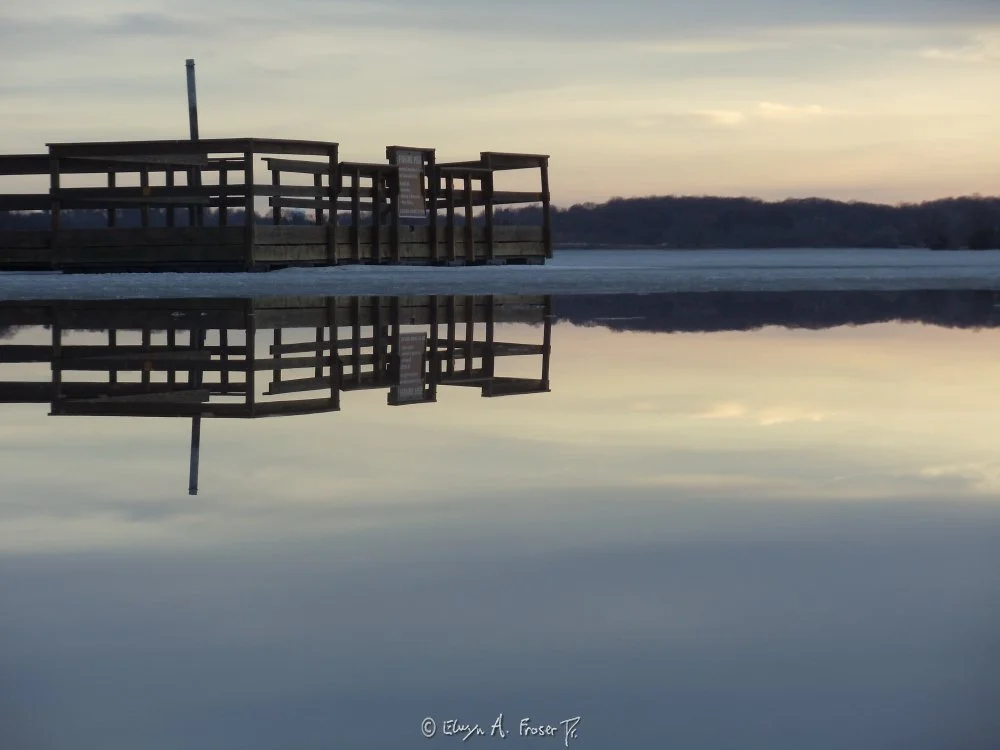 View 391 - calm lake reflecting wooden dock and partially cloudy rainbow colored sky, Humanity, Wildlife, Lake Minnewashta Regional Park Minnesota USA, Spring 2015