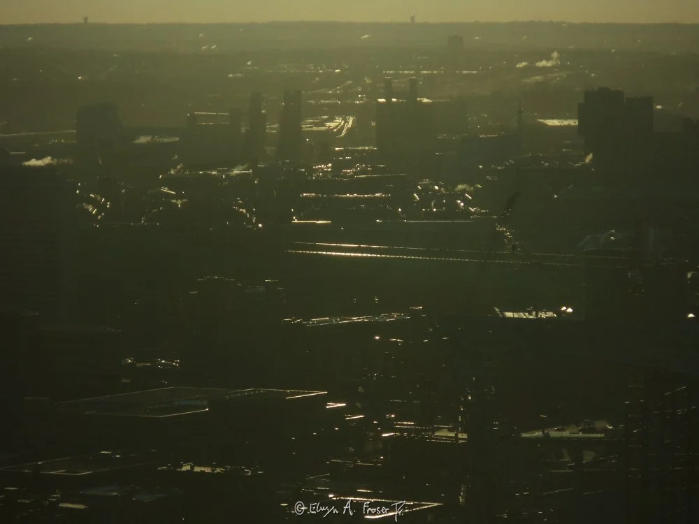 View 399 - silhouetted urban area gleaming under morning haze, Abstract, Humanity, Minneapolis Minnesota USA, Spring 2015