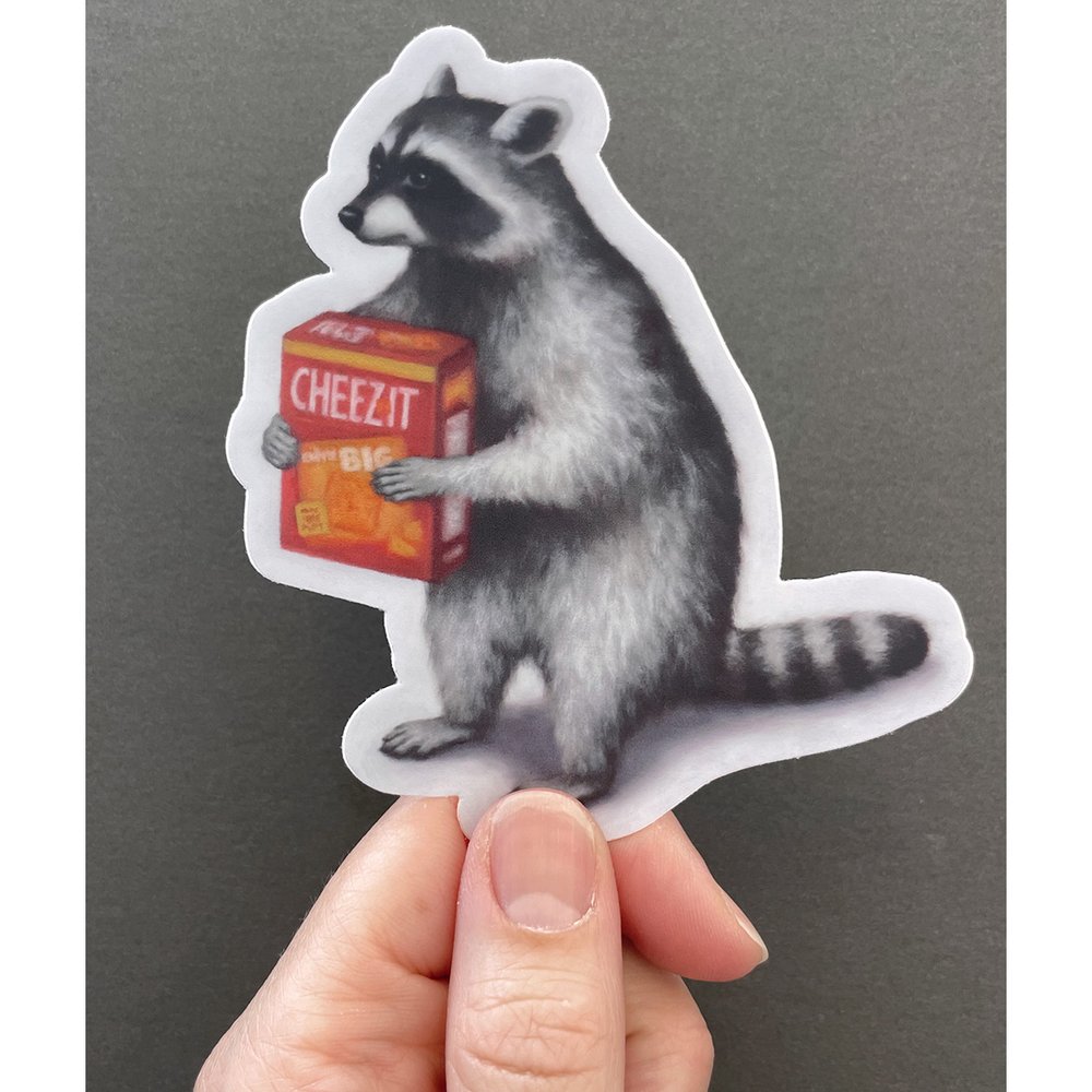 Raccoon holding crackers sticker — Sarah Becktel
