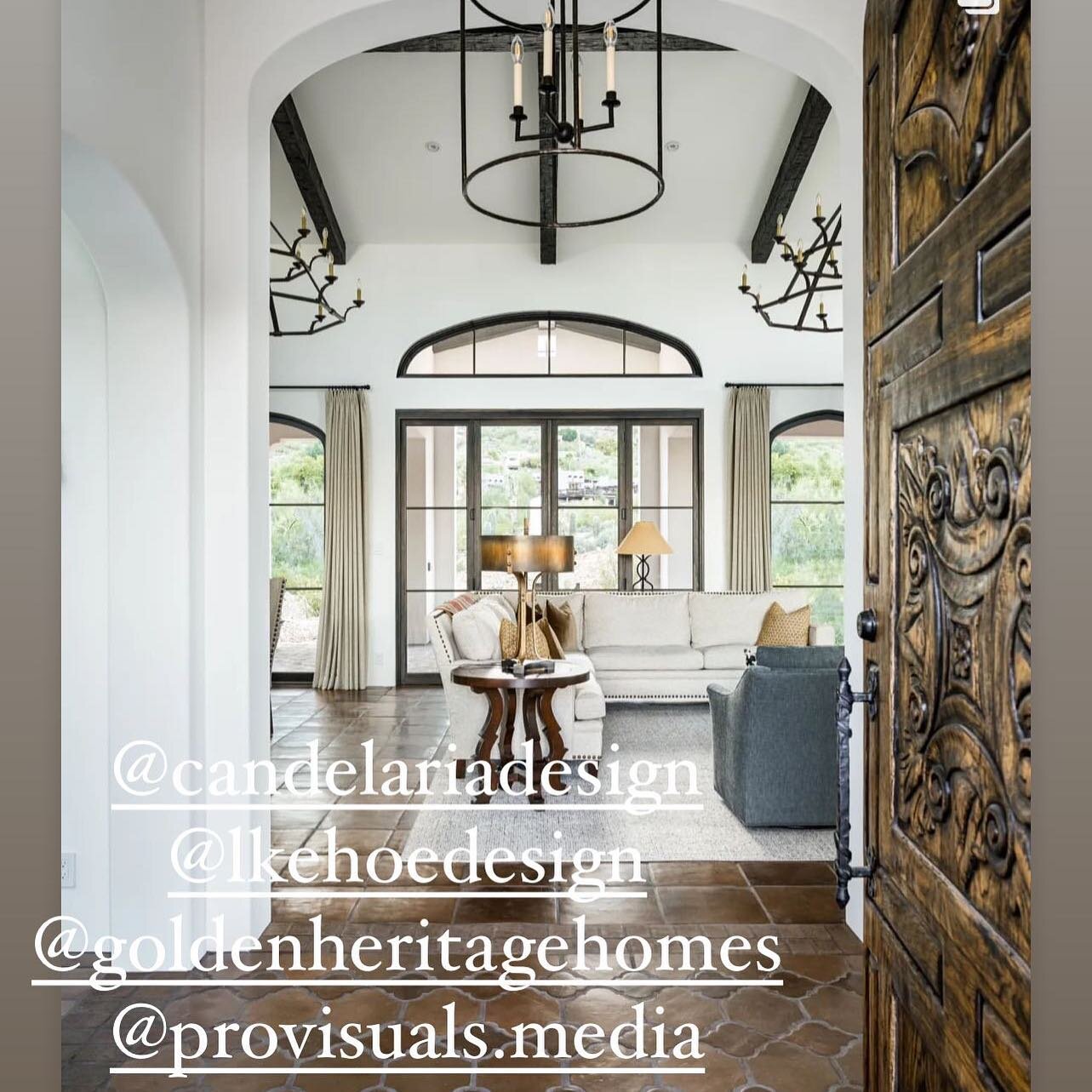 @provisuals.media Beautifully captured this hacienda style home. We created this stunning front door with hand carving as well as the carved vanity and hand forged iron hood. We worked with a very talented team @candelariadesign @goldenheritagehomes 