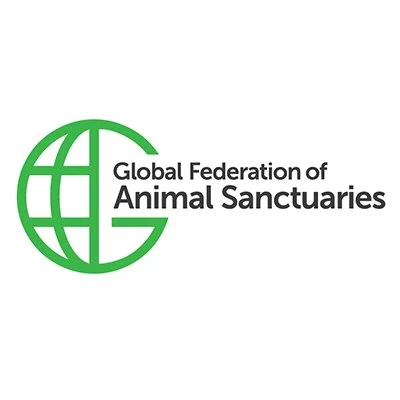 Logo of the Global Federation of Animal Sanctuaries, featuring a green globe with a stylized G and the organization's name.