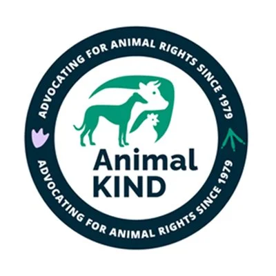 Circular logo with a green silhouette of a dog and a cat, text reading 'Advocating for Animal Rights Since 1979' and 'Animal KIND' in the center