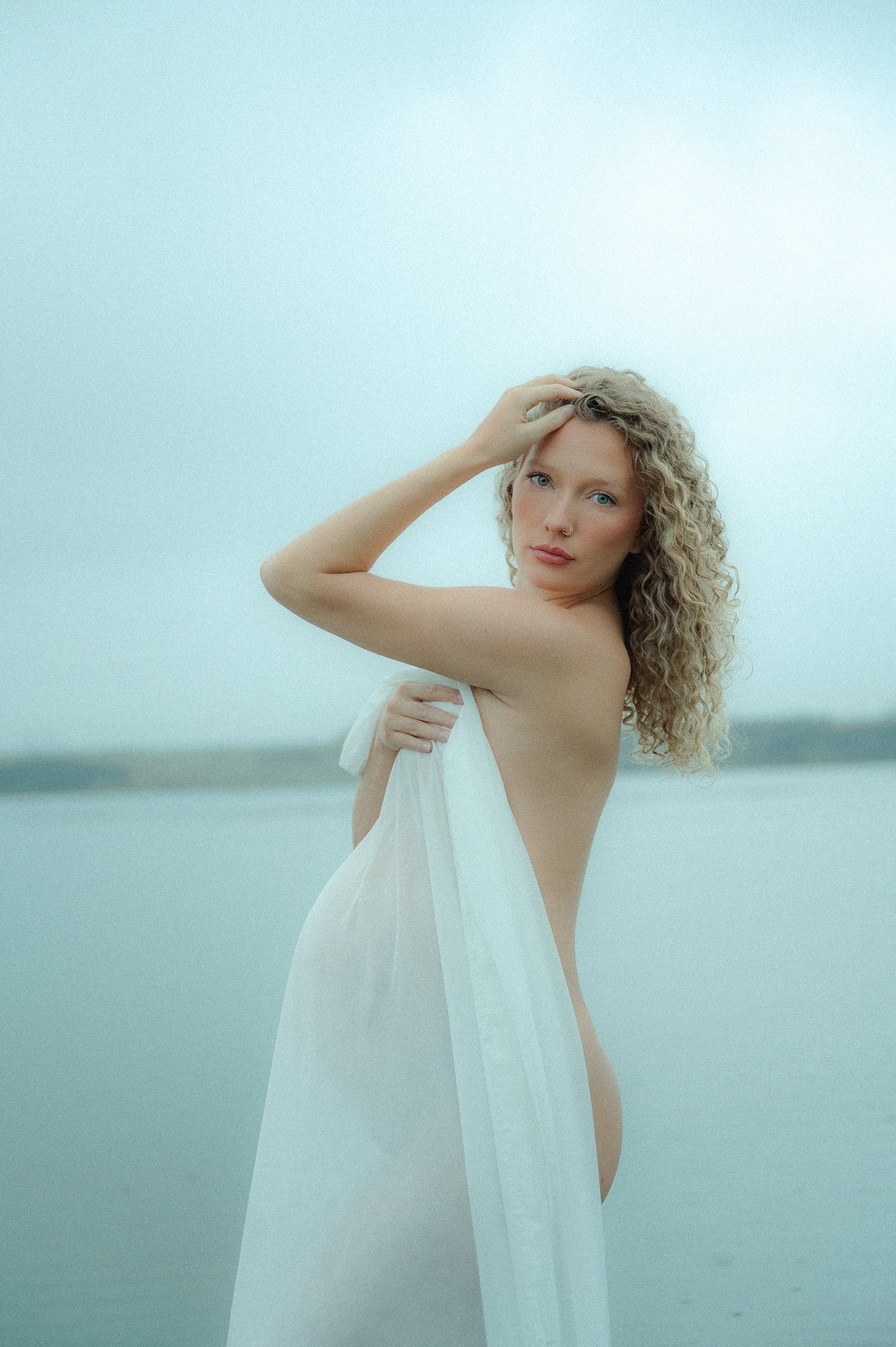 outdoor maternity boudoir photoshoot in water