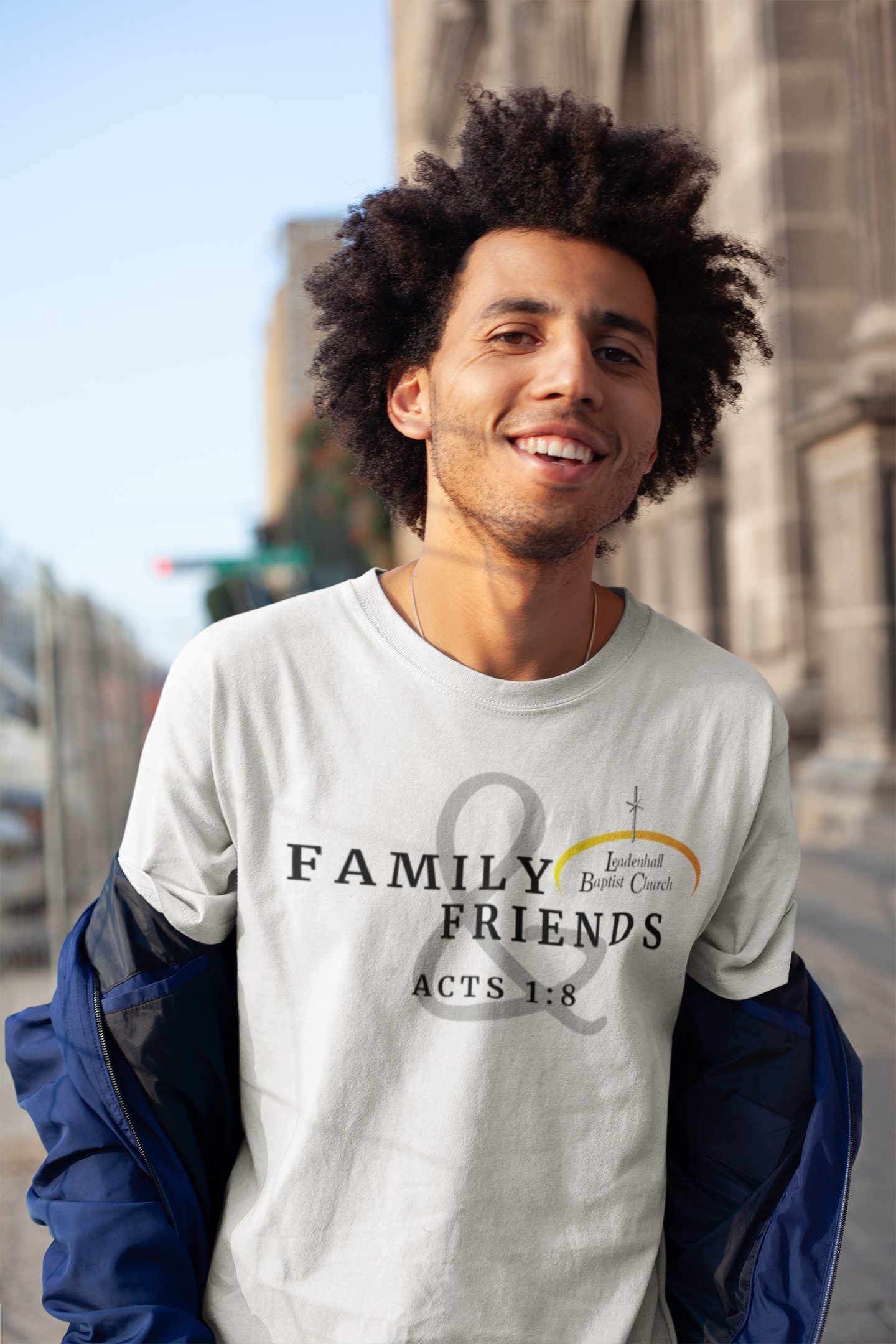 tee-mockup-of-a-happy-man-with-an-afro-out-on-the-street-18071.png