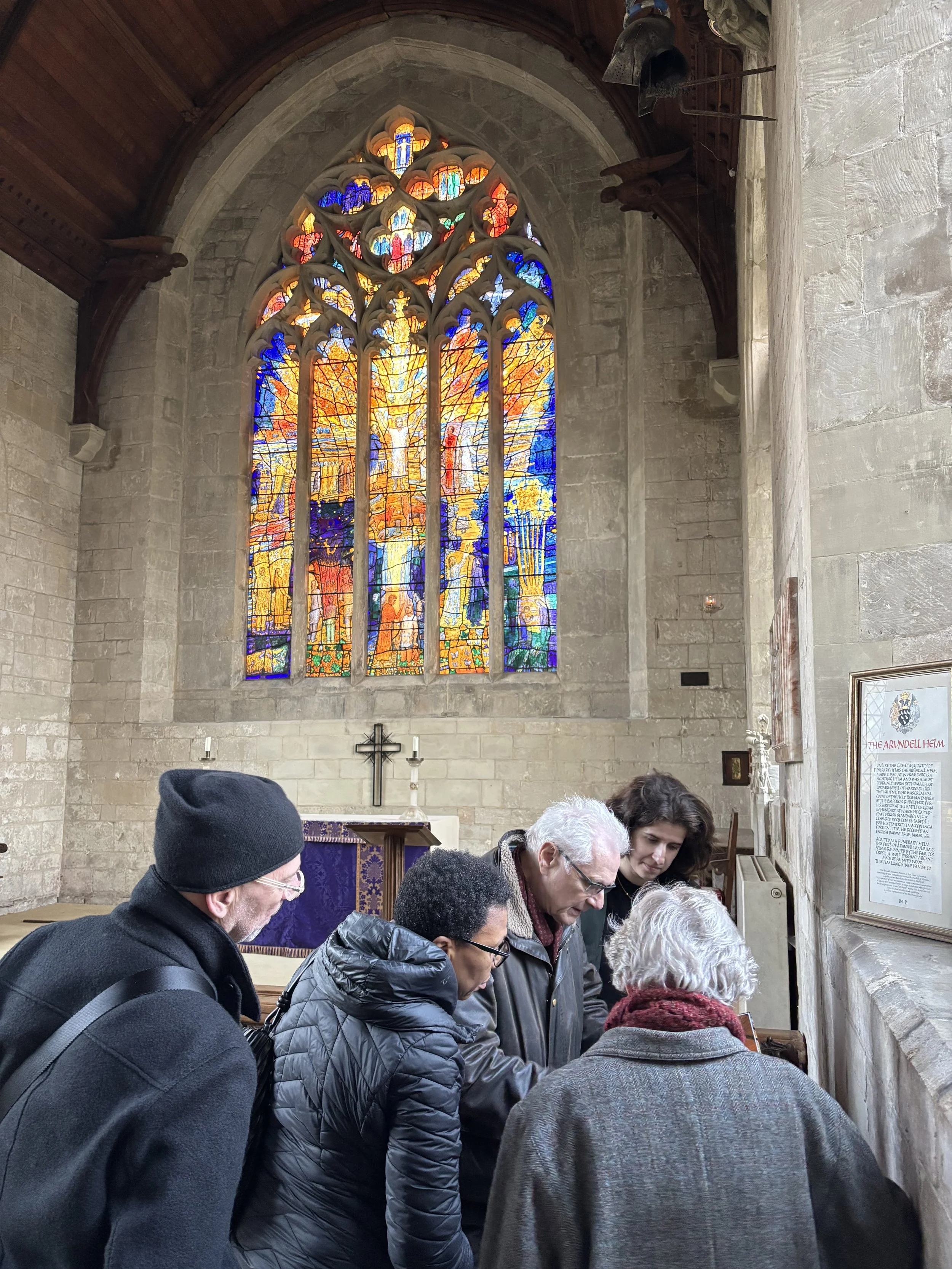Panel viewing the memorial book. Photo by Laura Moffatt