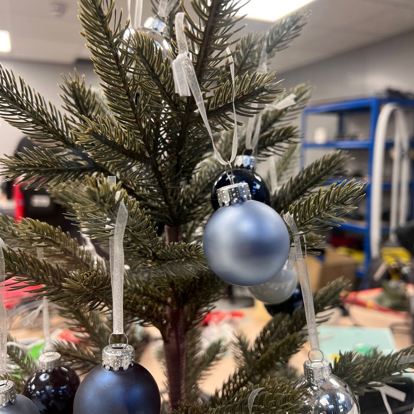 December 1st means one thing&hellip; Christmas Trees!! Here is a fine shot of our workshop tree that is accompanied by some Christmas music today. The office and break room also have their own trees. Who else has their work tree up? 
#christmastree #