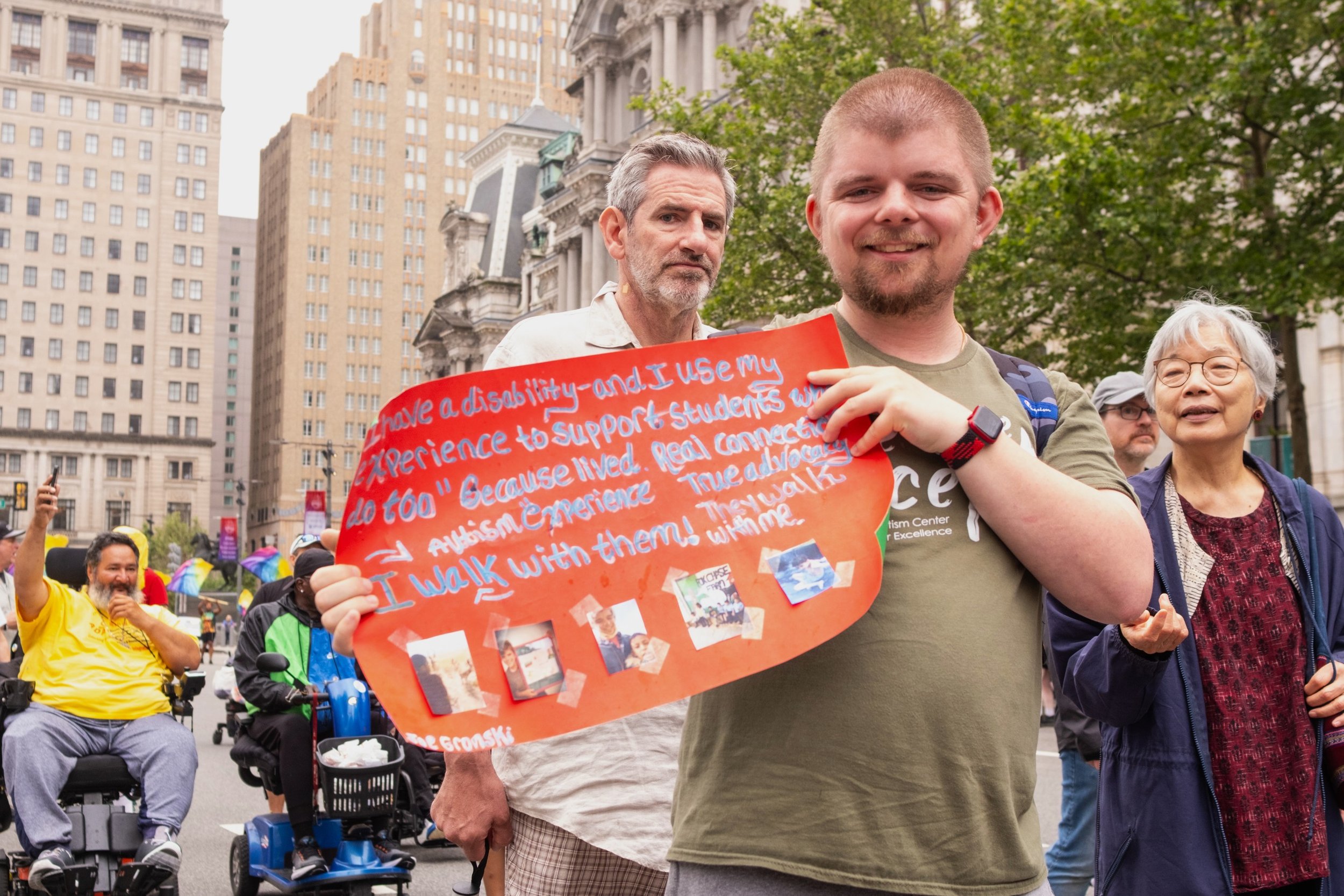 Man carrying sign