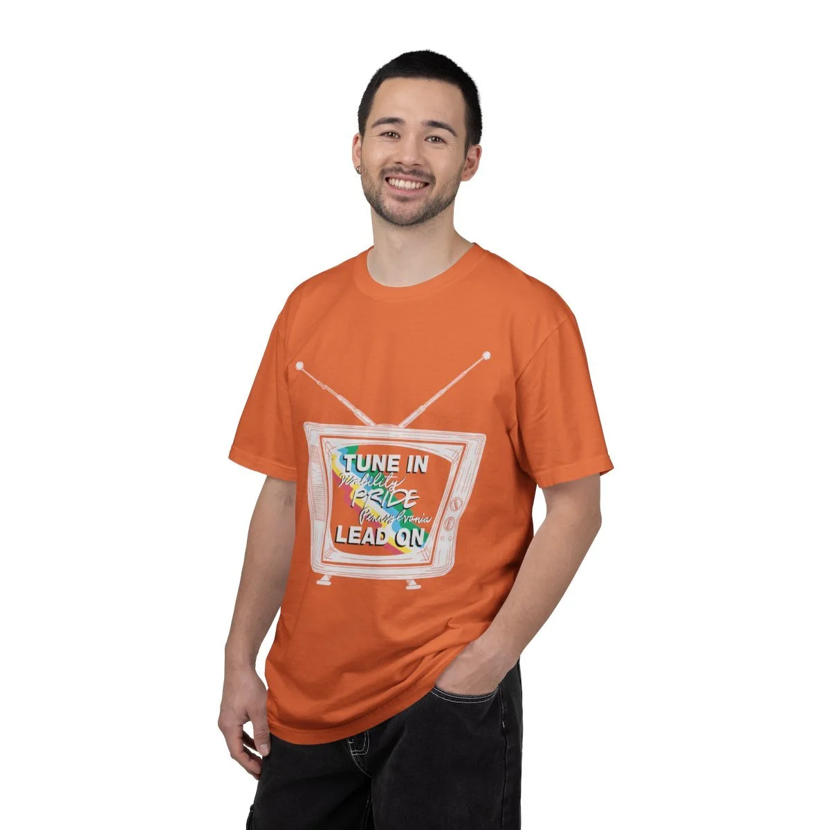 A person wearing an orange short sleeve t-shirt with Retro TV graphic on it.