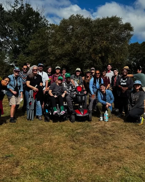 Little Sit attendees huddled together for a photo