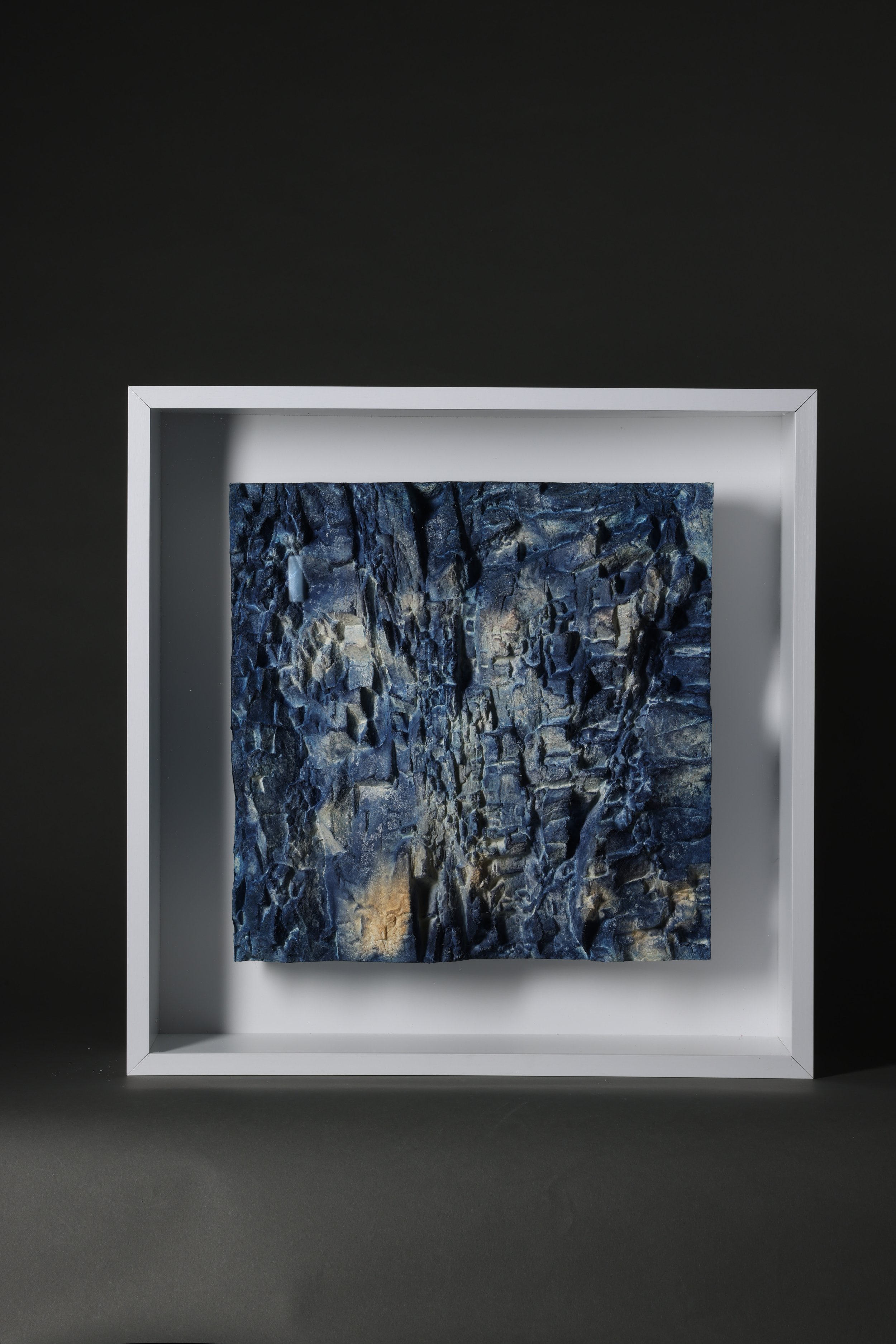 Framed cast paper sculpture by sculptor David Ruth