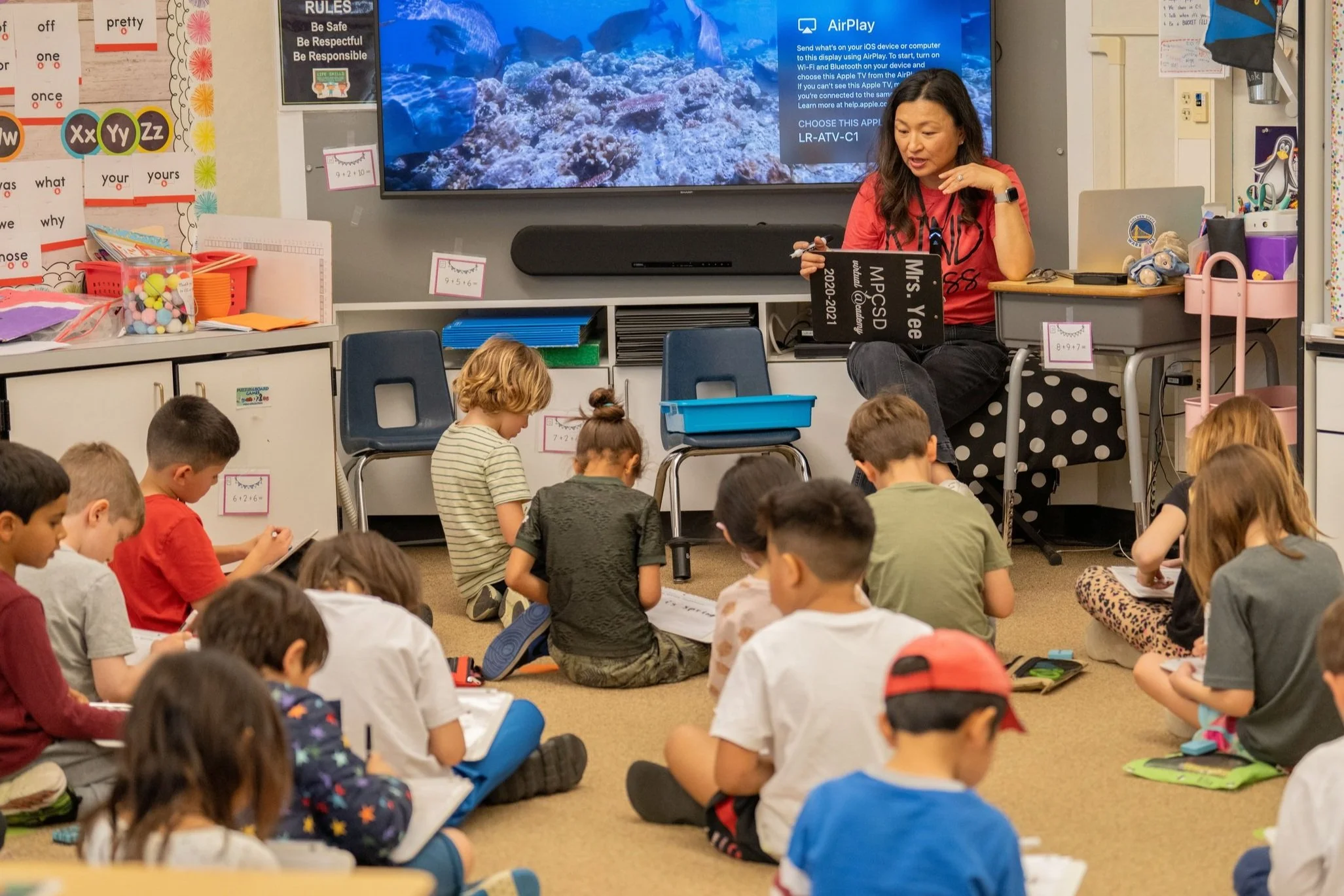 Laurel teacher leading class