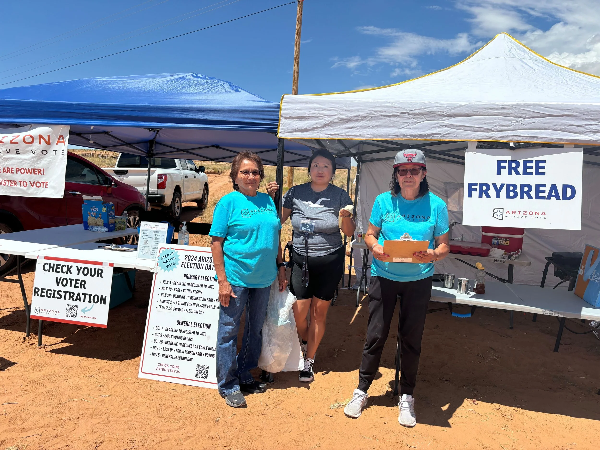 Photo of Arizona Native Vote Voter Registration Booth with Volunteers and Free Fry bread.