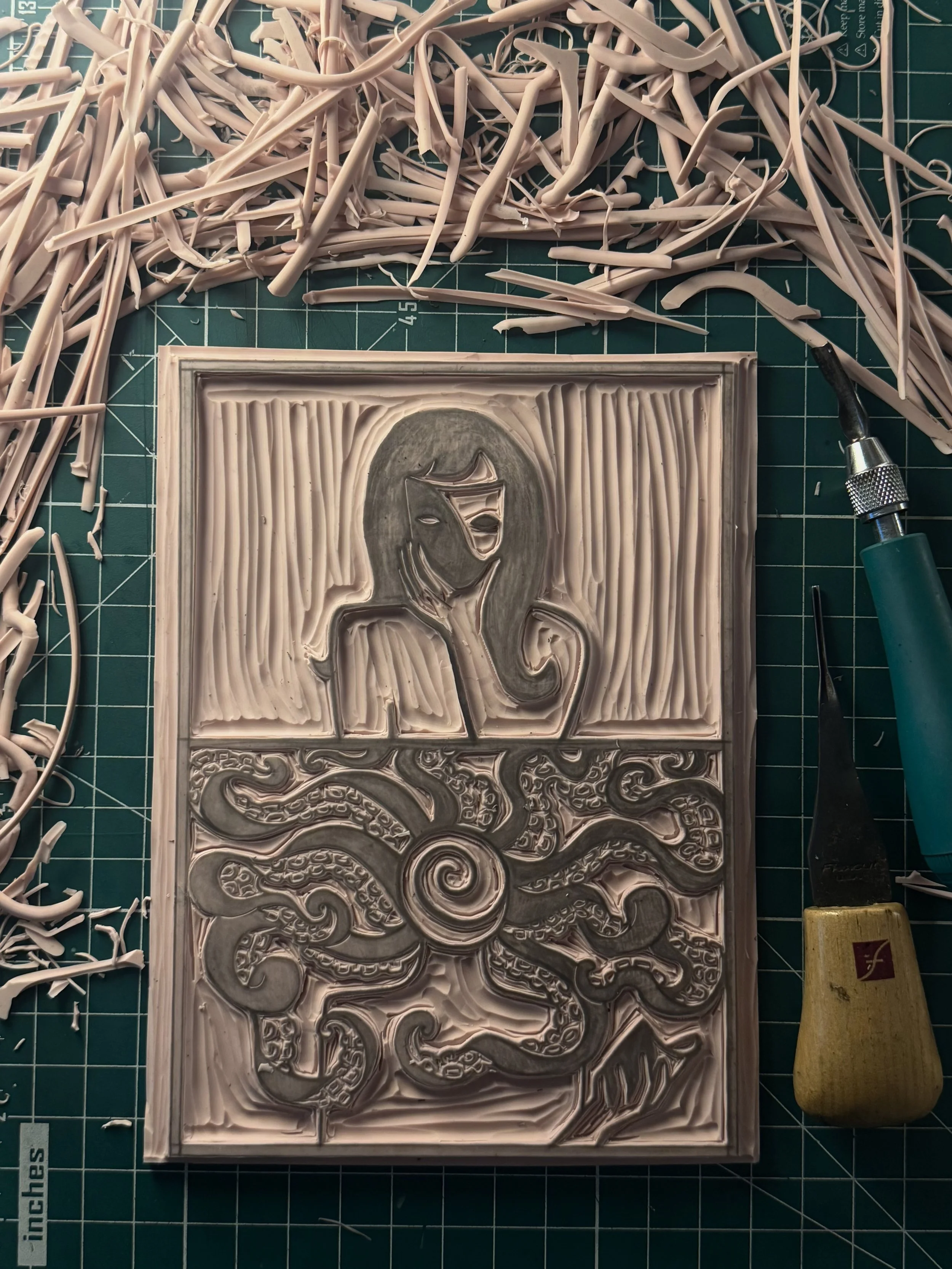 I-QUIT-spiral-tentacles-out-of-face-blockprint-carved-block.jpg