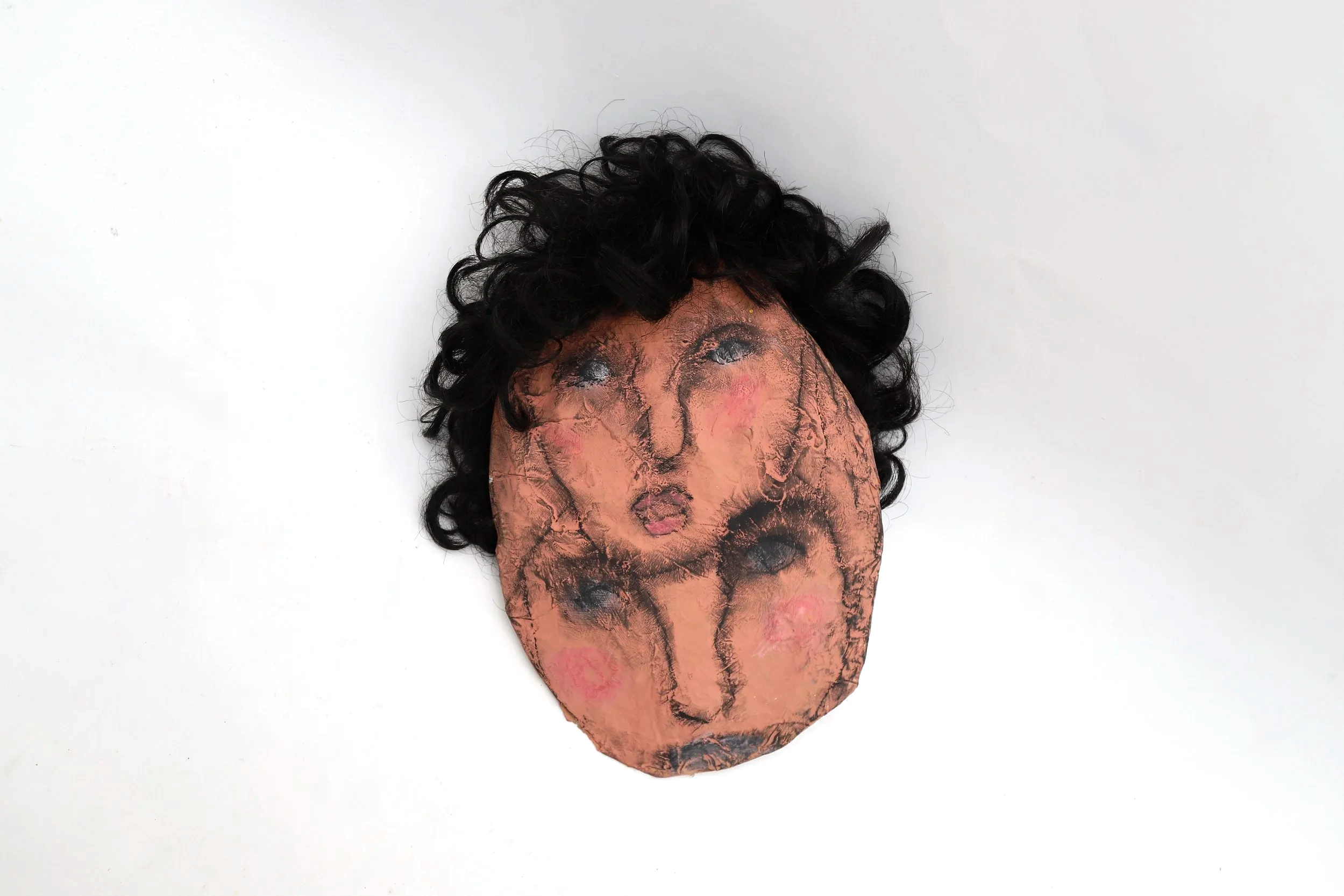 Twins in womb, 2025

- House paint, charcoal, hair, papier-mâché
- (tbc)