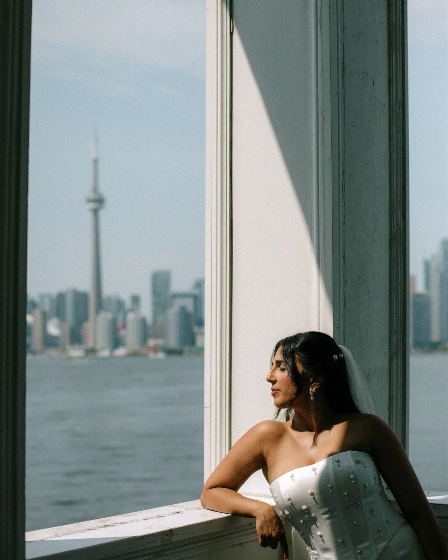 RCYC Toronto wedding photography with Aperol tones, modern elegance, and island light.

A preview of what&rsquo;s to come.
 Clean lines.
 Soft light.
 Colour that feels alive.
 The skyline watching from across the water.

Being on the island is alway