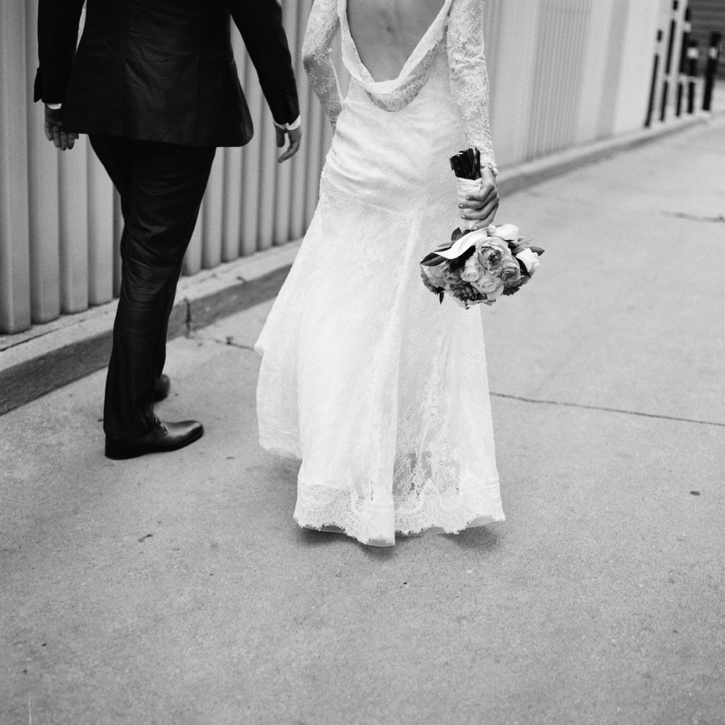 Intimate wedding photography in Downtown Toronto, captured on black and white film.

These were made more than ten years ago.
And yet, nothing feels dated.
Film remembers what digital sometimes forgets.

I&rsquo;ve always included film in my wedding 