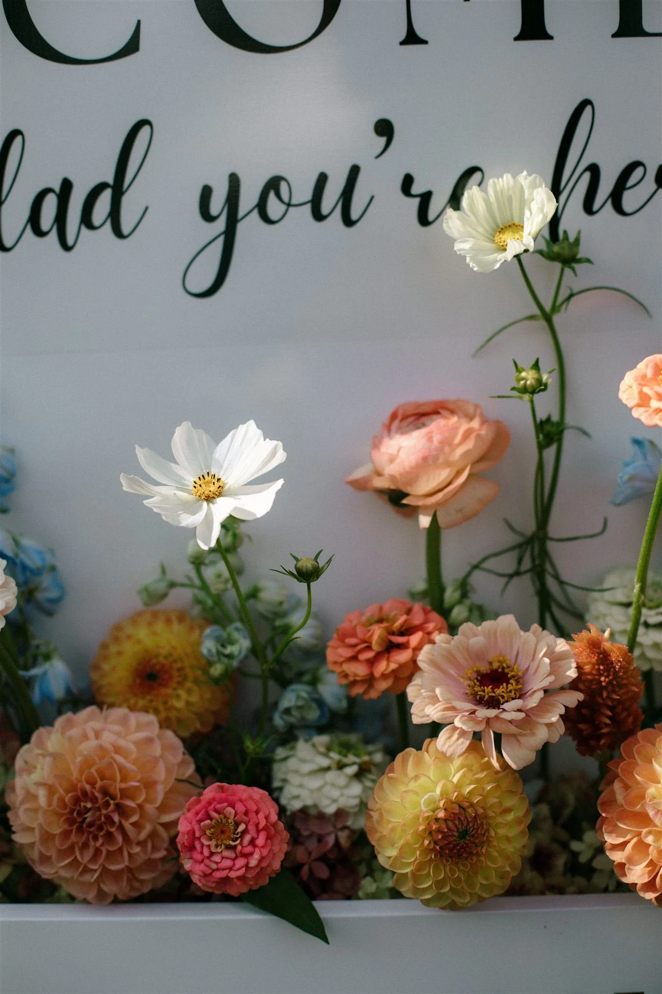 Welcome flowers in sunlight by Three Bird Flower Farm at Northridge Inn wedding