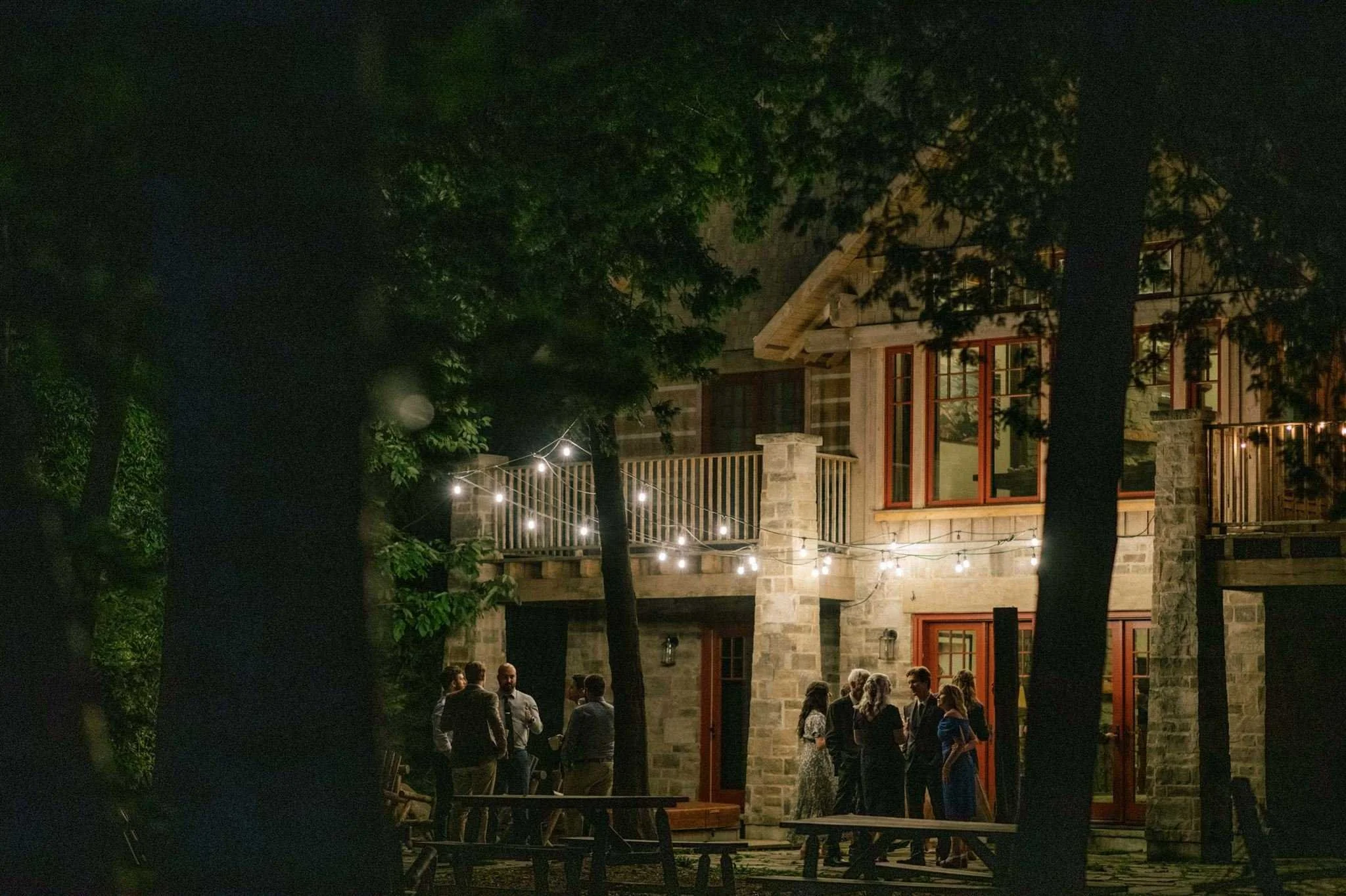 Serenity Cottage intimate wedding at night time with string lights