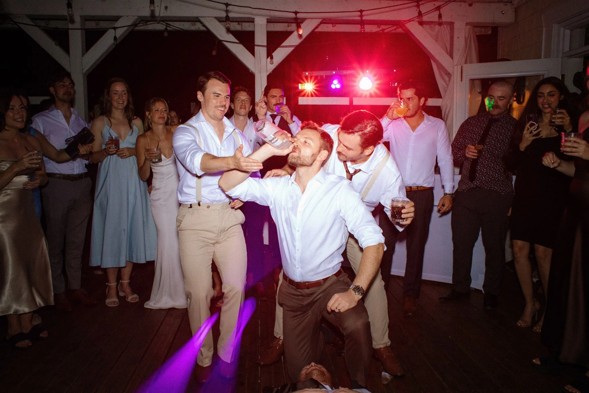 Guests dancing at night during Northridge Inn wedding reception