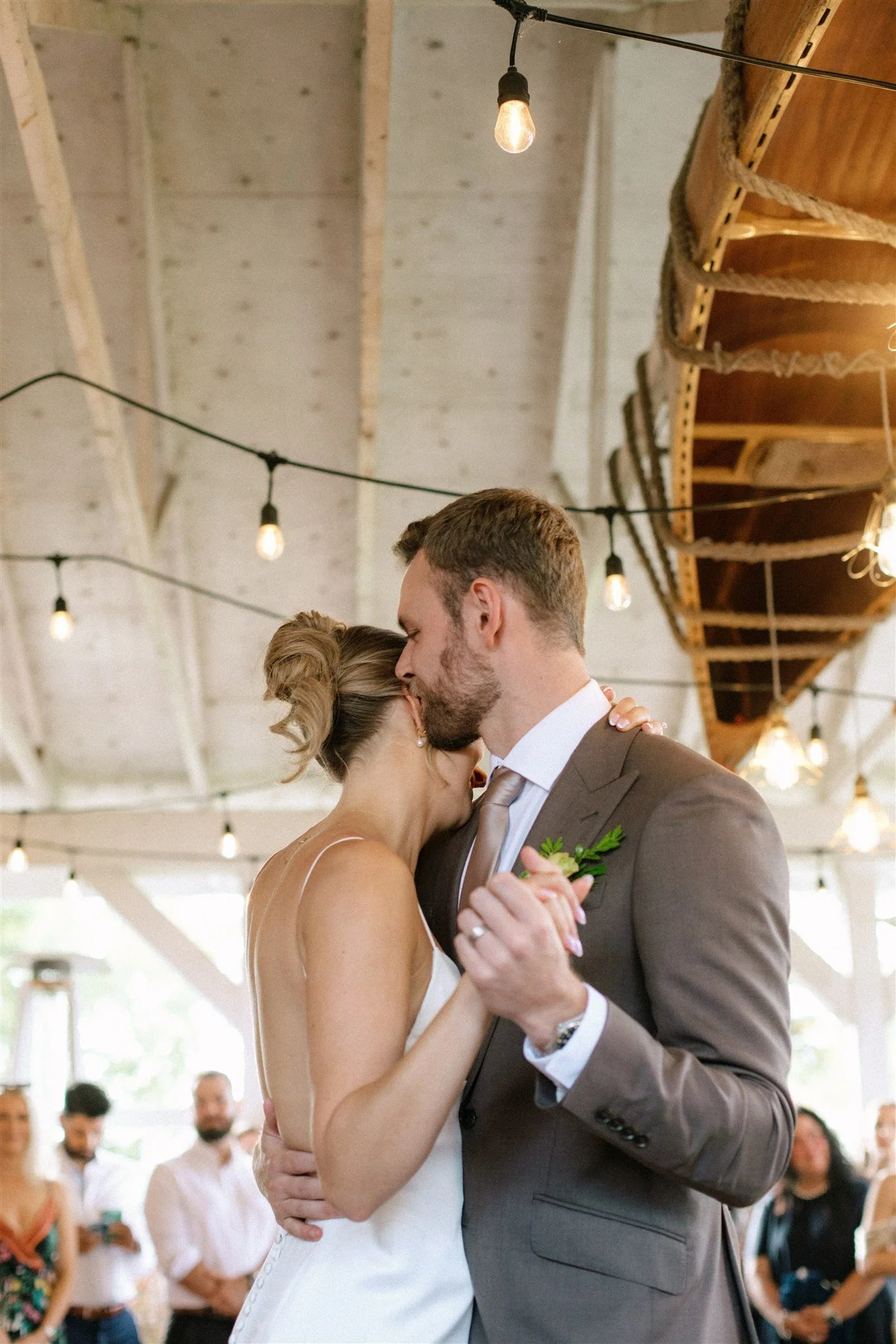 First dance on the terrace beneath a canoe at Northridge Inn wedding