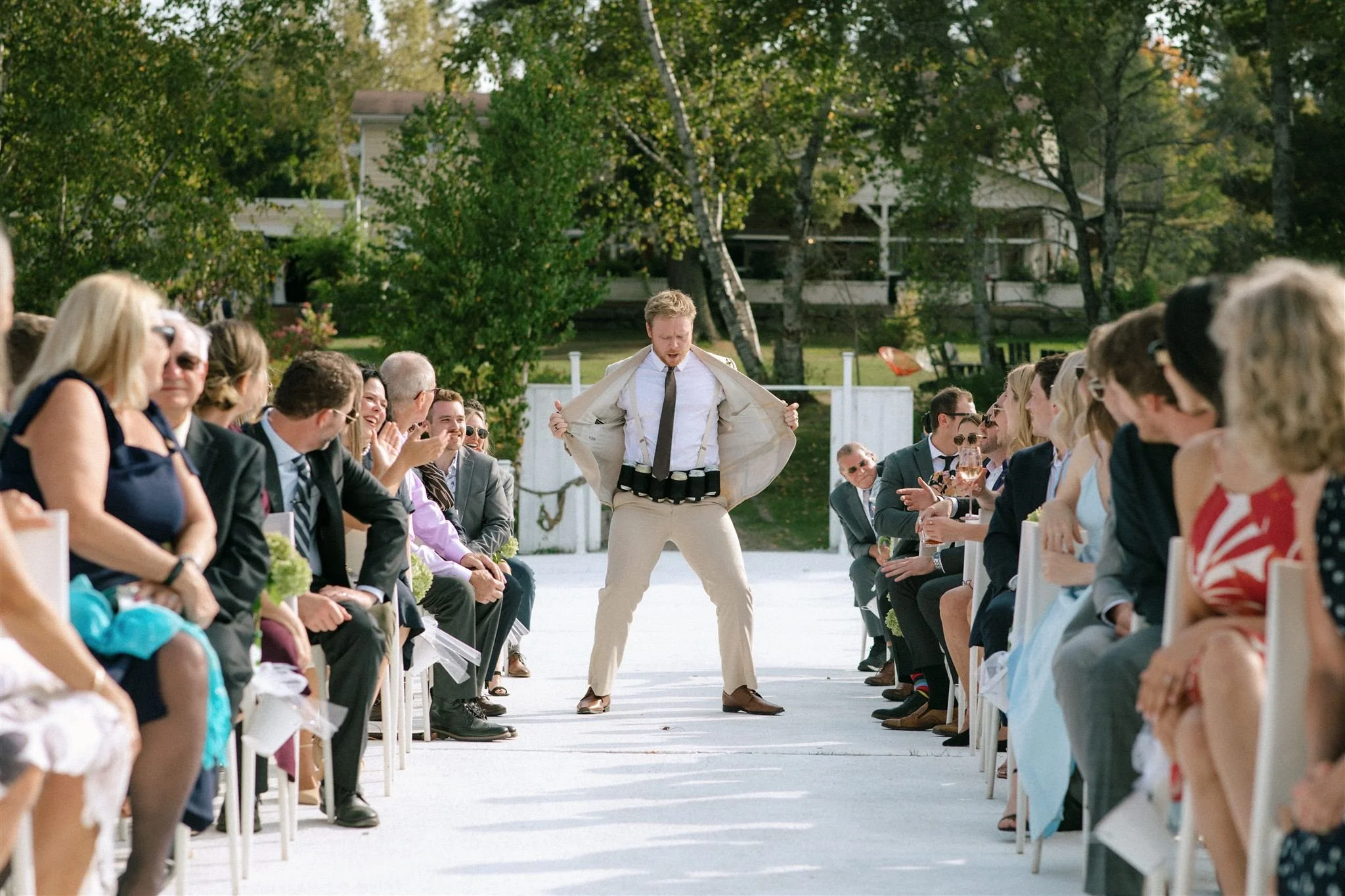 Beer boy walking down the aisle at the start of a Northridge Inn wedding ceremony