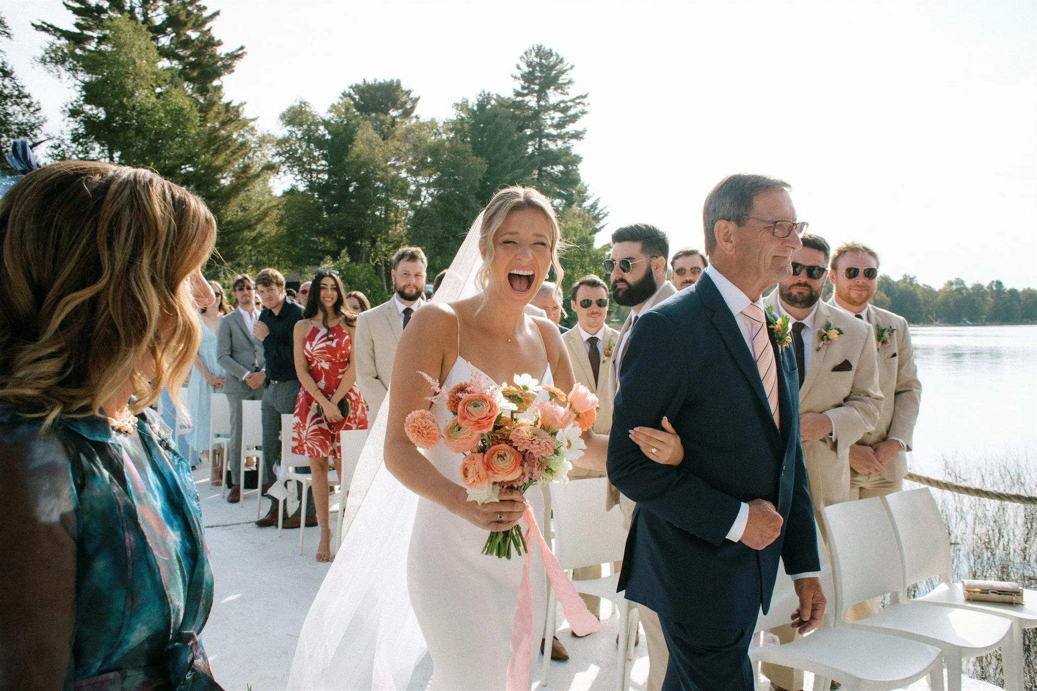 Emotional moment as bride walks down the aisle with her father at Northridge Inn wedding