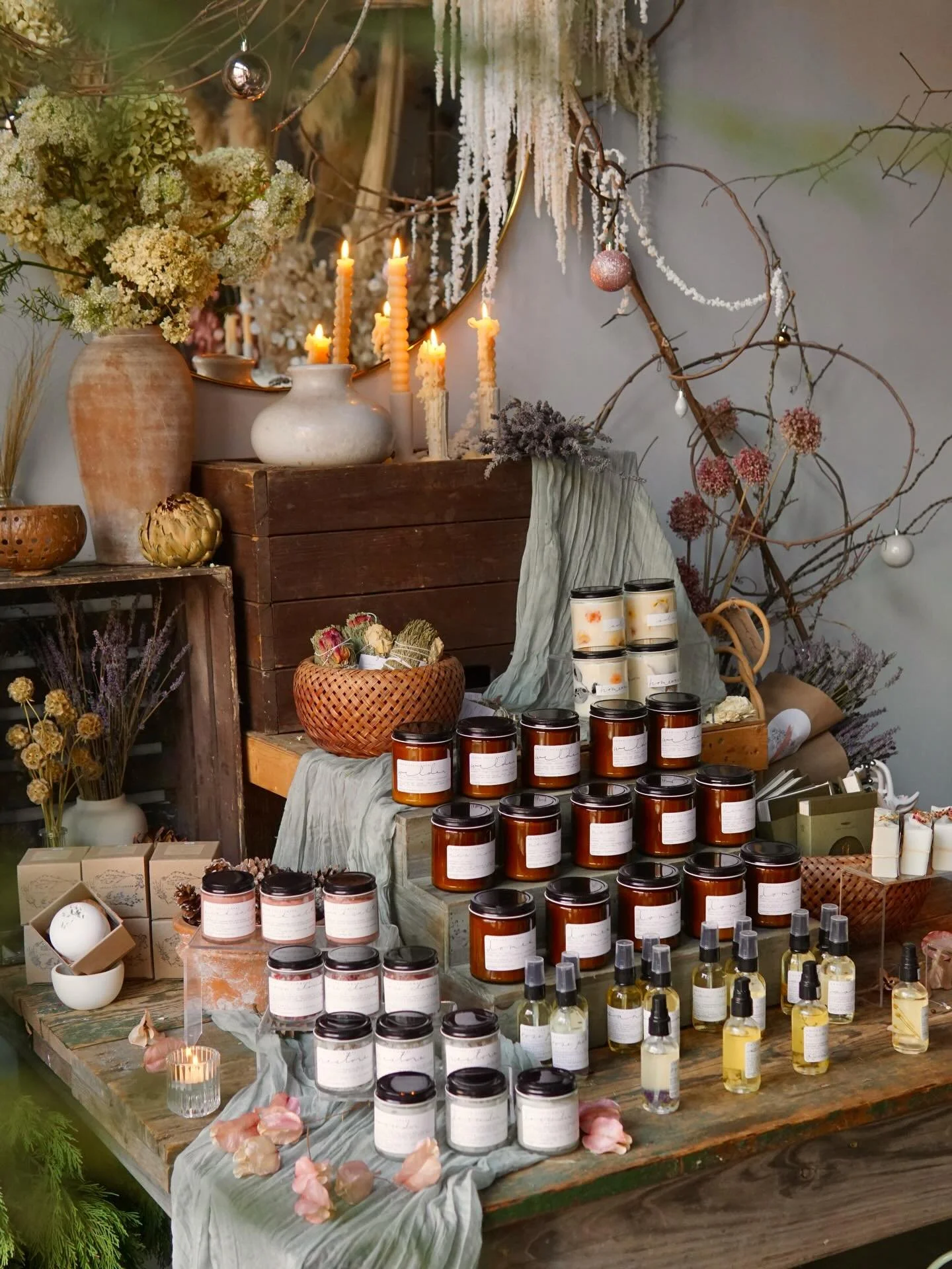 If you&rsquo;re doing some last minute shopping for stocking stuffers, white elephant gifts, or retail therapy we have a fully stocked apothecary section ready to go! Homemade soaps by @thebodycove; candles, scrubs, oils &amp; more by @among.the.flow