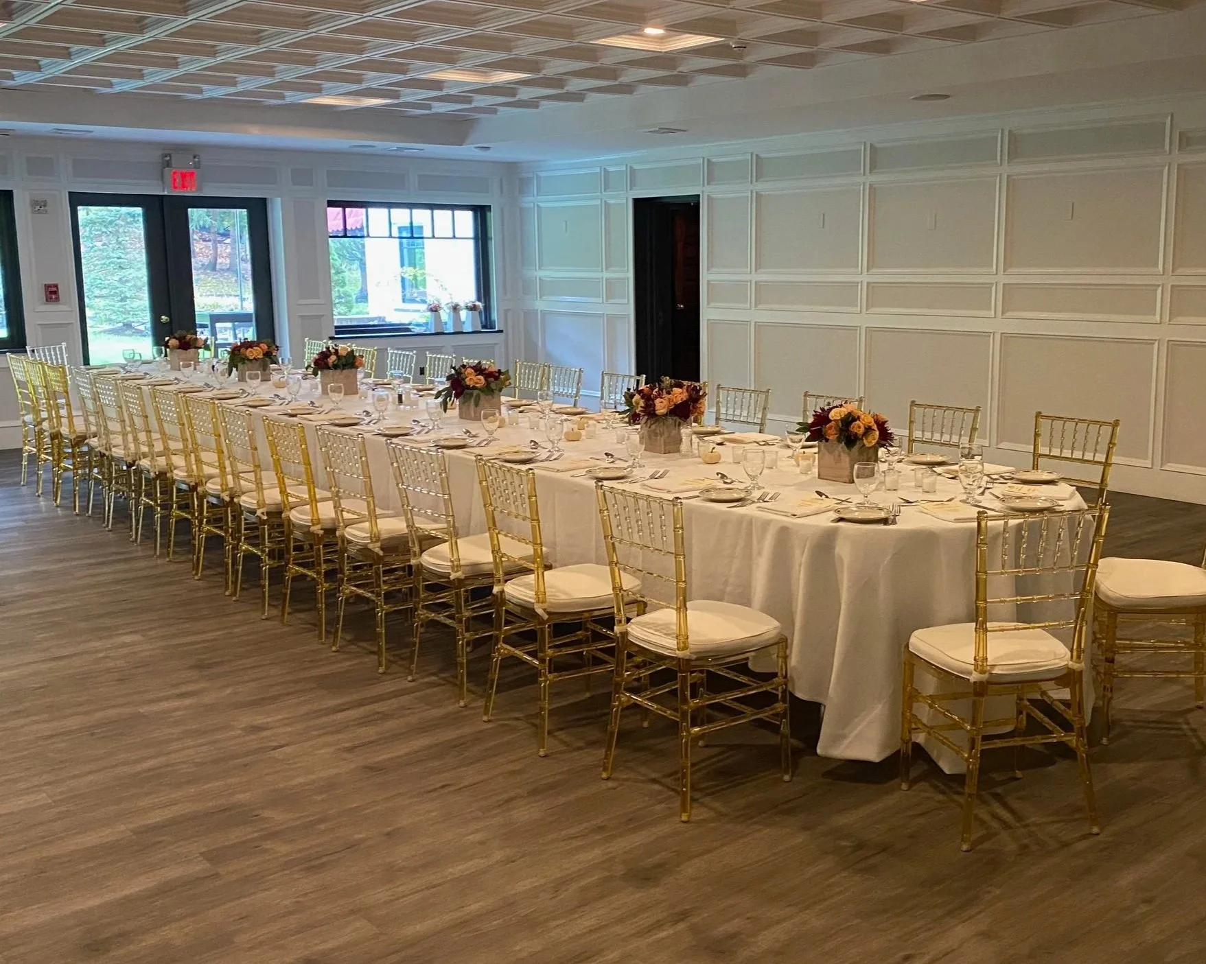 Long banquet table setup for an athletic awards ceremony and dinner.