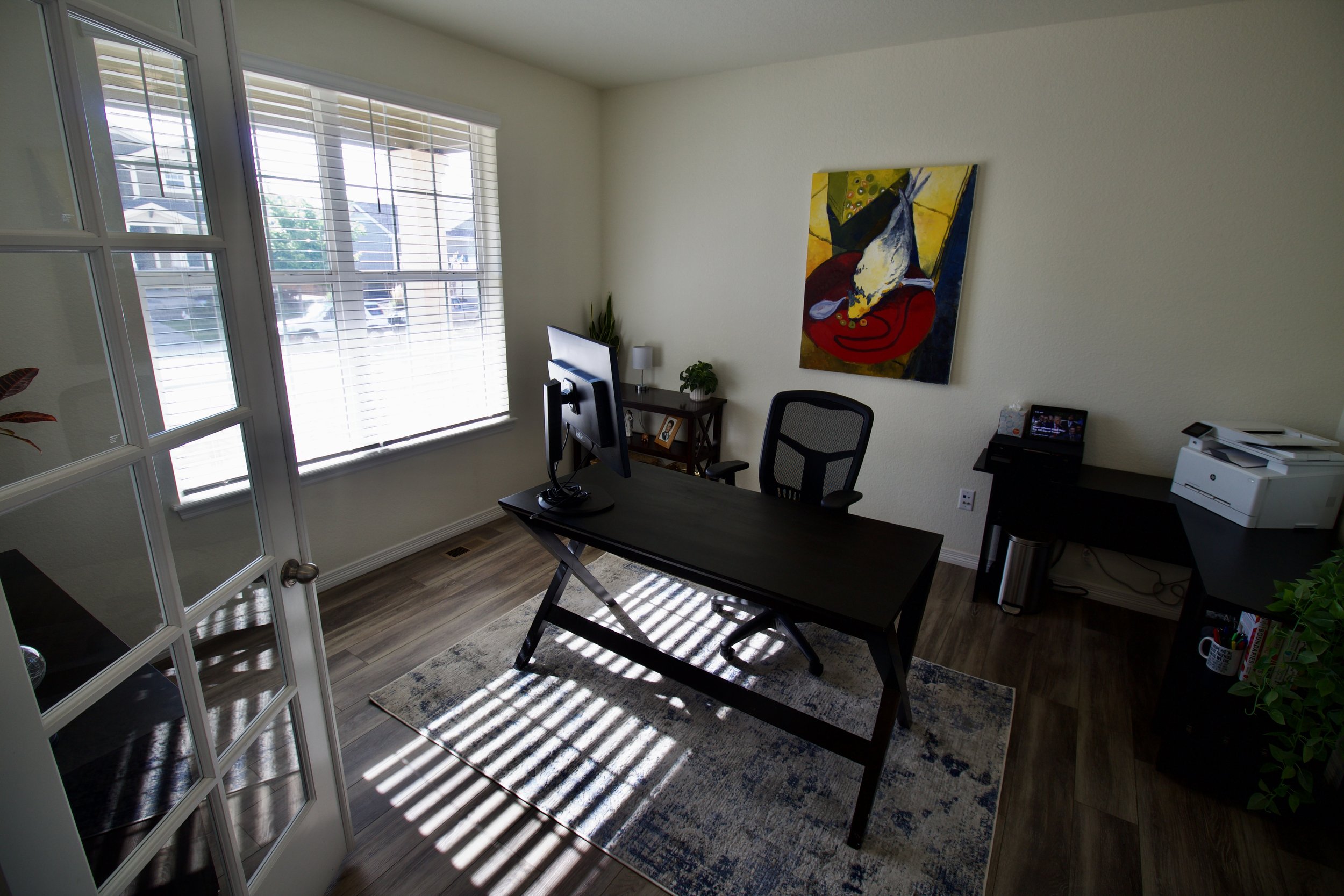 Home Office. Near the front door, the owner loves this feature as they work from home!