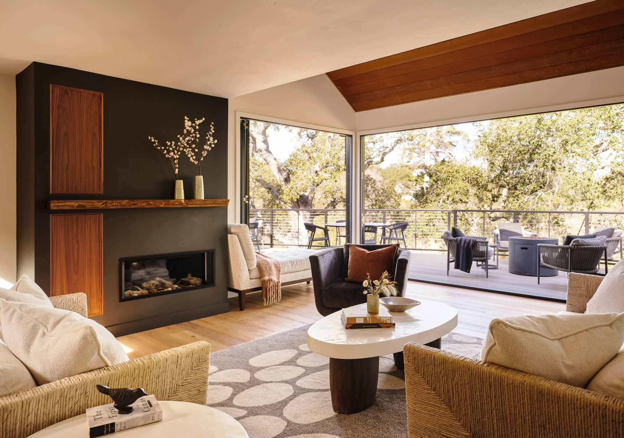 Living Room View of Panoramic Opening to Nature and the Deck