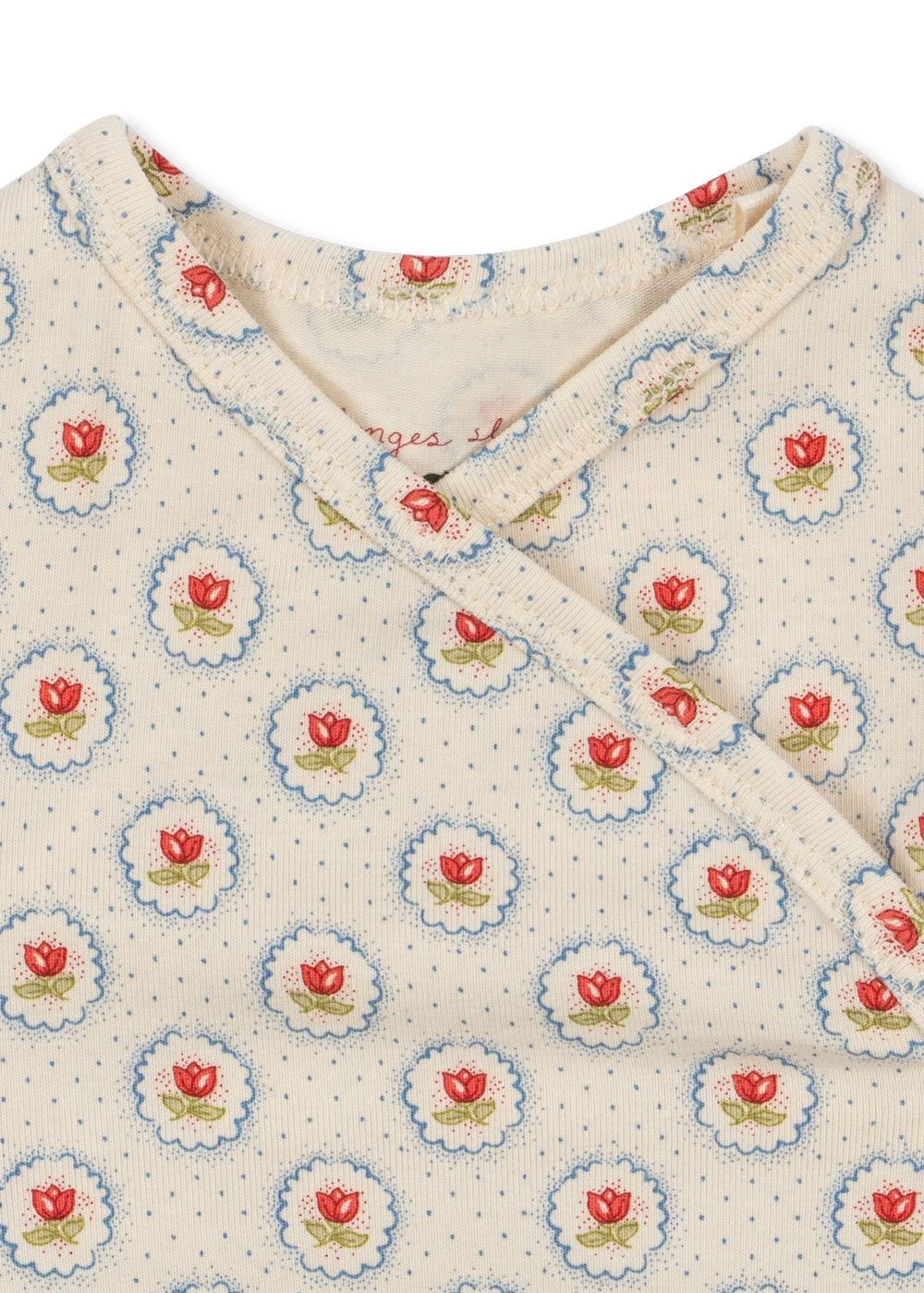 Wickelbody für Neugeborene aus Bio-Baumwolle mit zartem Blumenprint Mirage und seitlichen Druckknöpfen im Concept Store Cleo&Caesar