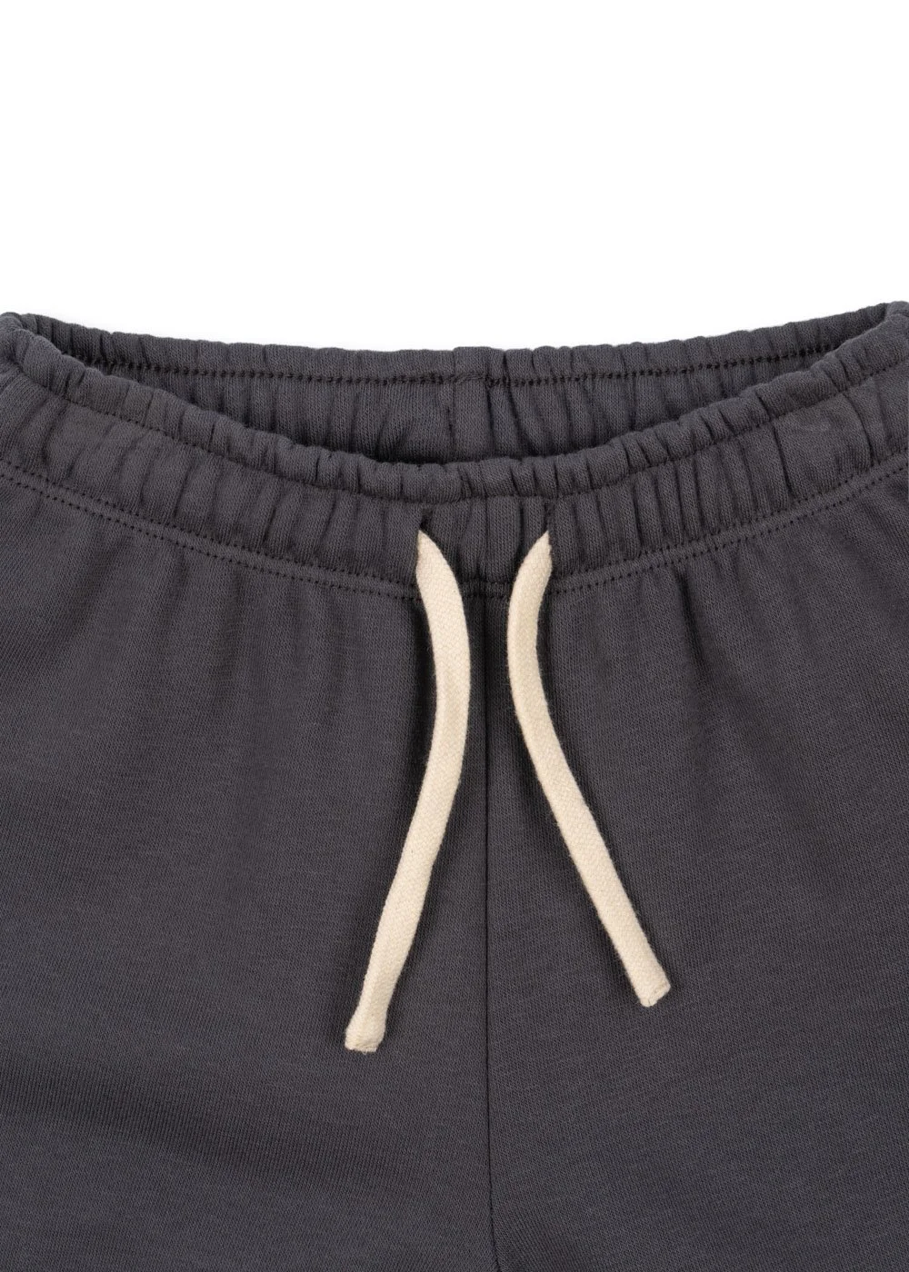 Lou Sweat Pants Jogginghose Magnet für Kinder von Konges Sløjd – kuschelige, nachhaltige Kinderkleidung in Beige mit Herzprint, erhältlich bei Cleo&Caesar Kids Concept Store Berlin.