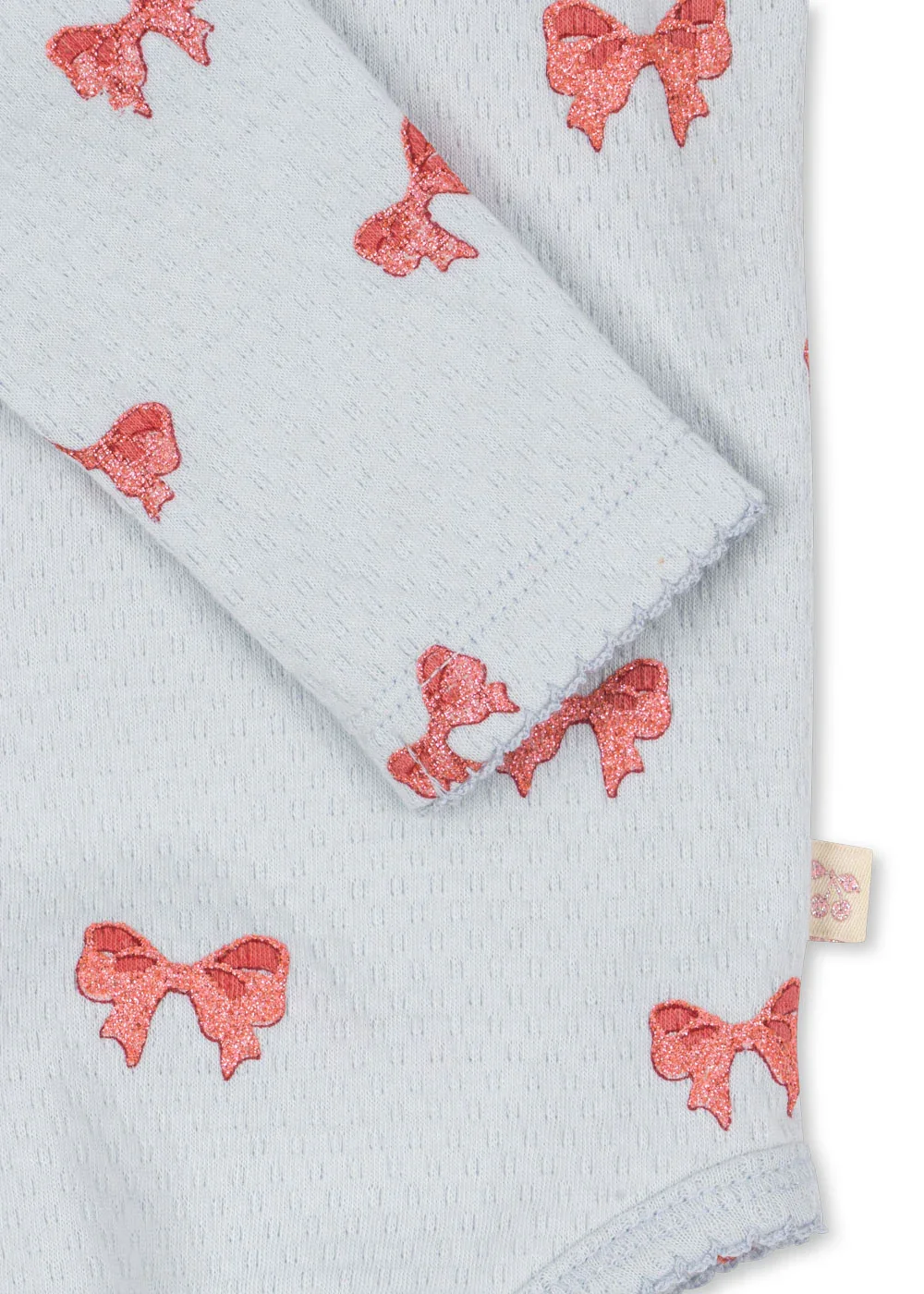 Konges Sløjd Sui Frill Body Rosia Blue Bow – Bio-Baumwolle mit Rüschen an den Schultern | Cleo & Caesar