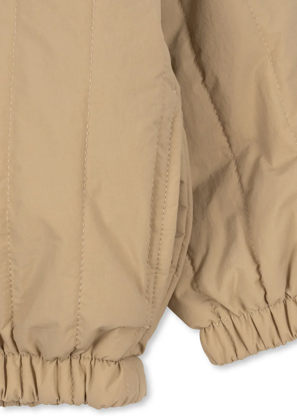 Juno Bomber Jacke Travertine für Kinder von Konges Sløjd – kuschelige, nachhaltige Kinderkleidung in Beige mit Herzprint, erhältlich bei Cleo&Caesar Kids Concept Store Berlin.