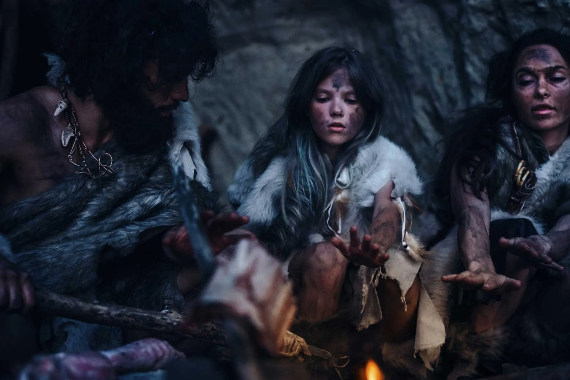 Hunter gatherers around a fire